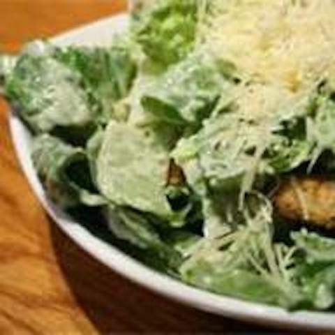Order Caesar Salad food online from Singas Famous Pizza store, Glen Oaks on bringmethat.com