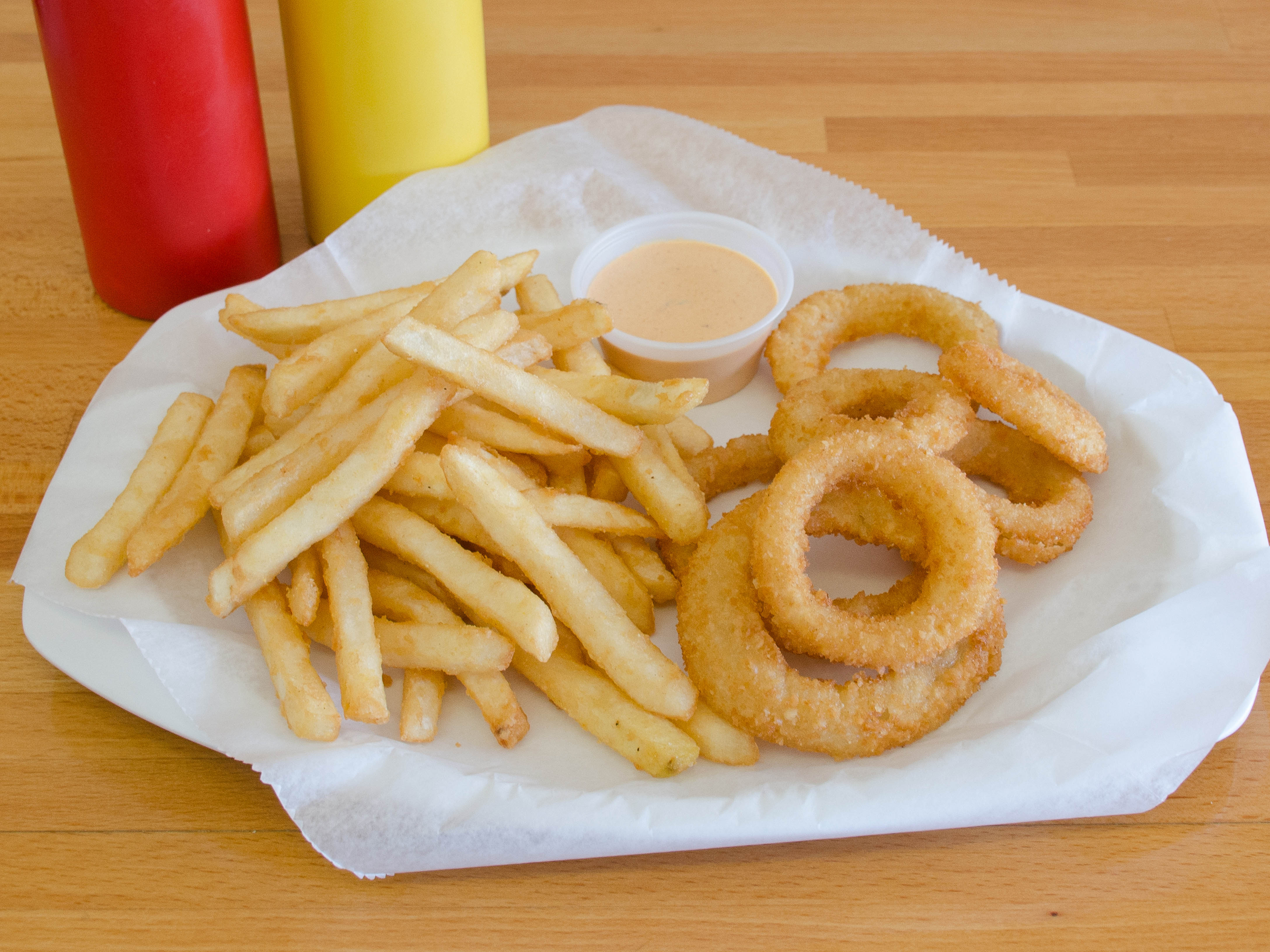 Order French Fries food online from P.S. Burgers store, Mineola on bringmethat.com