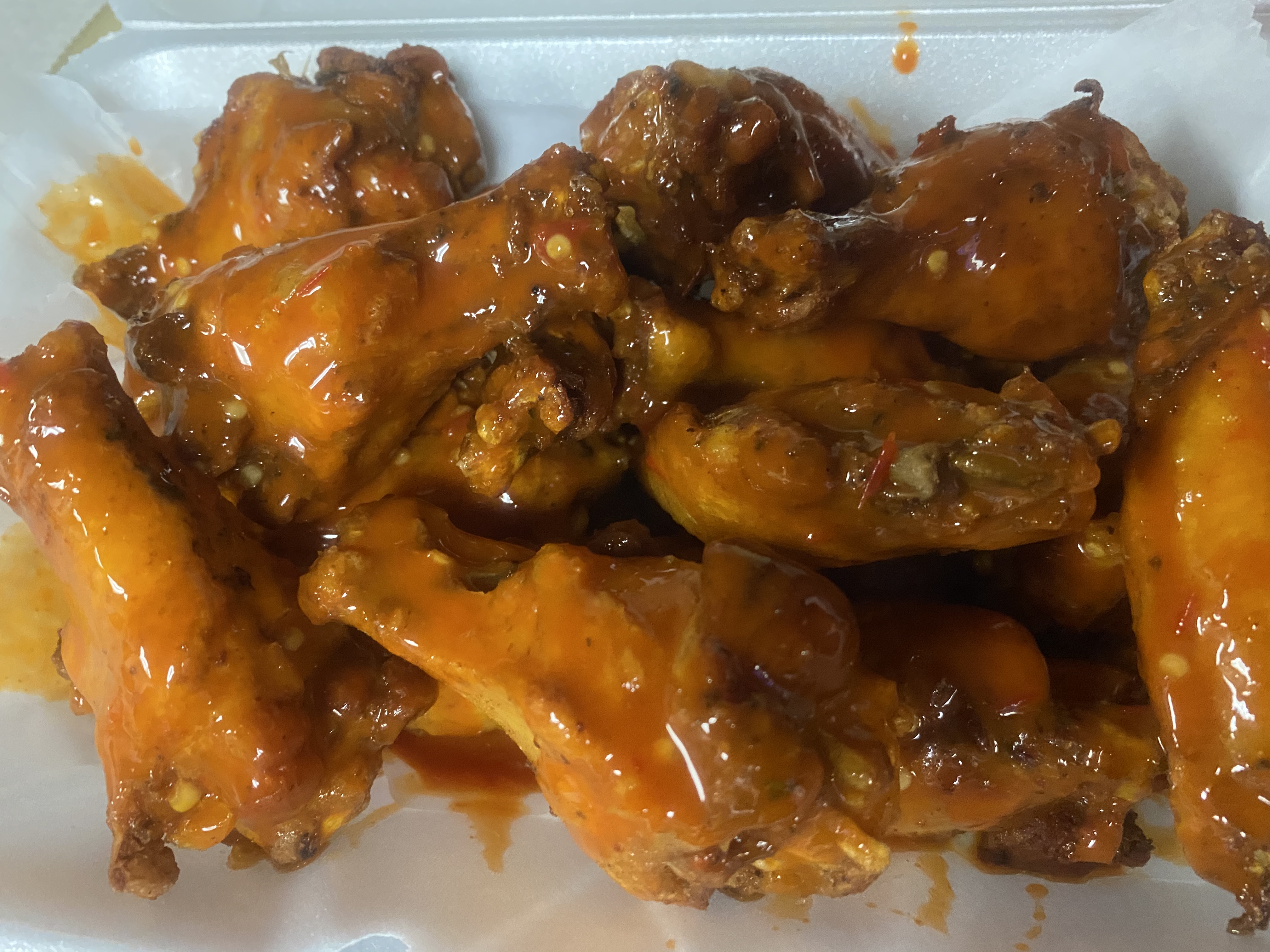 Order 12 Wings food online from Flava Wingz Spot store, Irvington on bringmethat.com