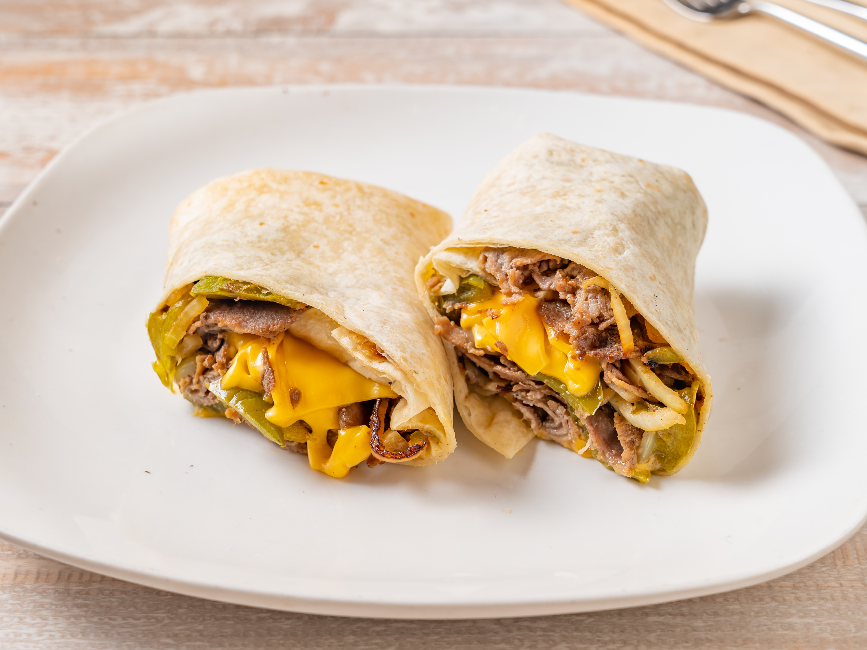 Order Philly Cheese Steak  Wrap food online from Cousins Pizzeria store, Bronx on bringmethat.com
