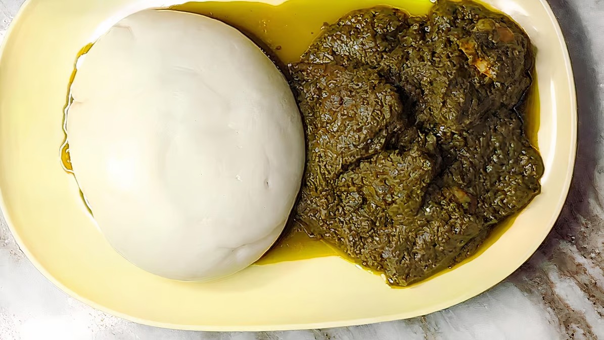 Order Cassava Leaf Soup and Yam Fufu food online from Prime Restaurant store, Hyattsville on bringmethat.com