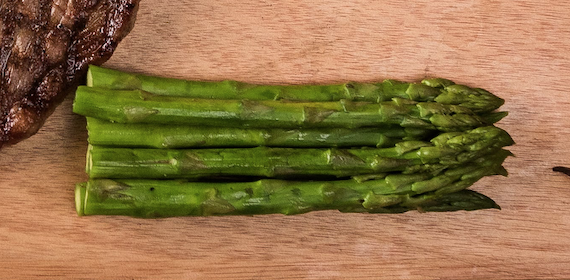 Order Grilled Asparagus food online from Great American Steakhouse store, El Paso on bringmethat.com