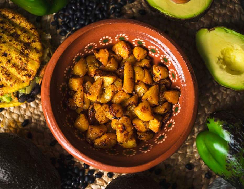 Order ~ Side Baked Plantains food online from Guasaca store, Raleigh on bringmethat.com