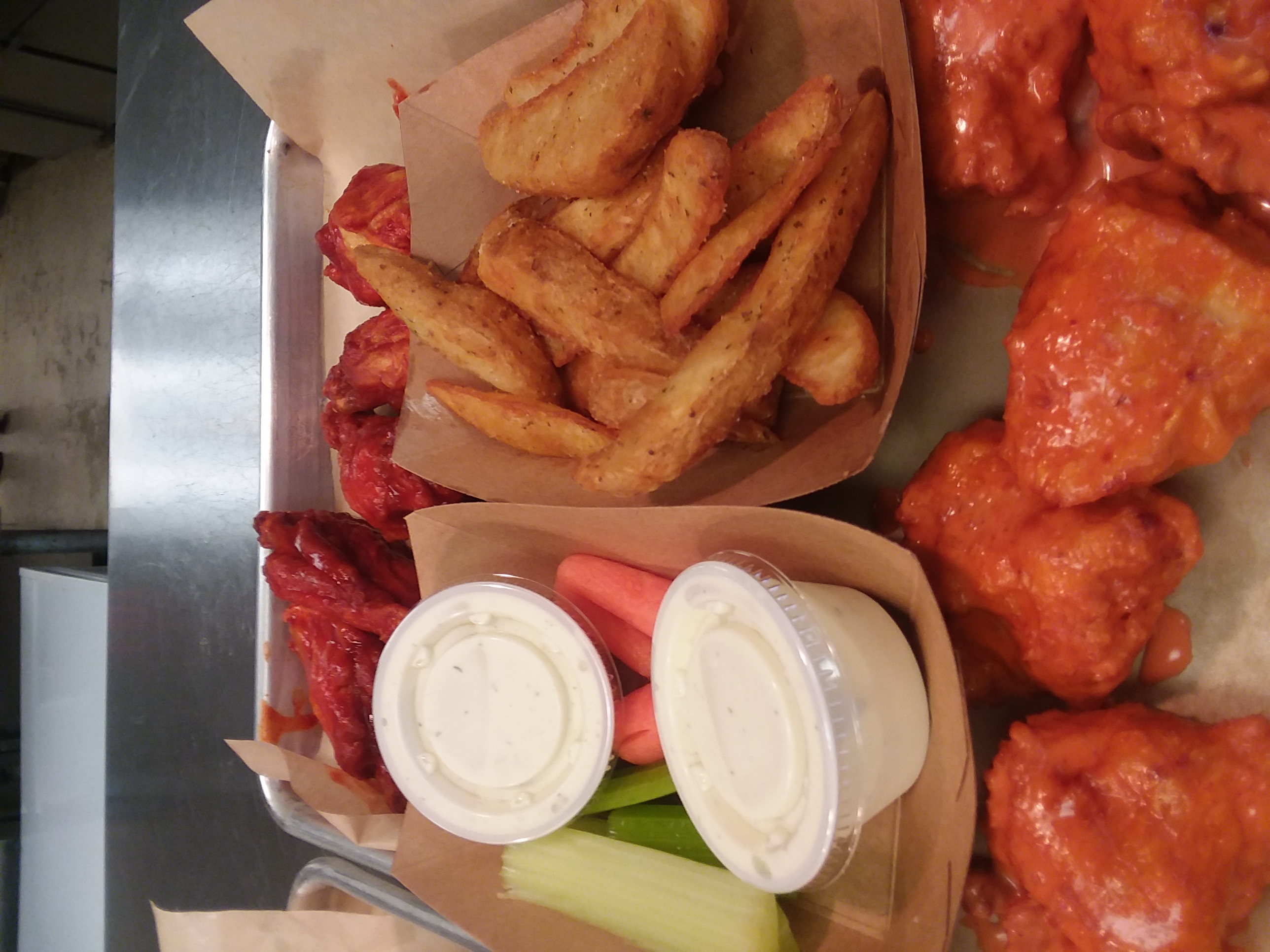 Order 10 Wing Combo with Fries (5 Bonless & 5 Bonein) food online from Rocket Wings store, Seguin on bringmethat.com