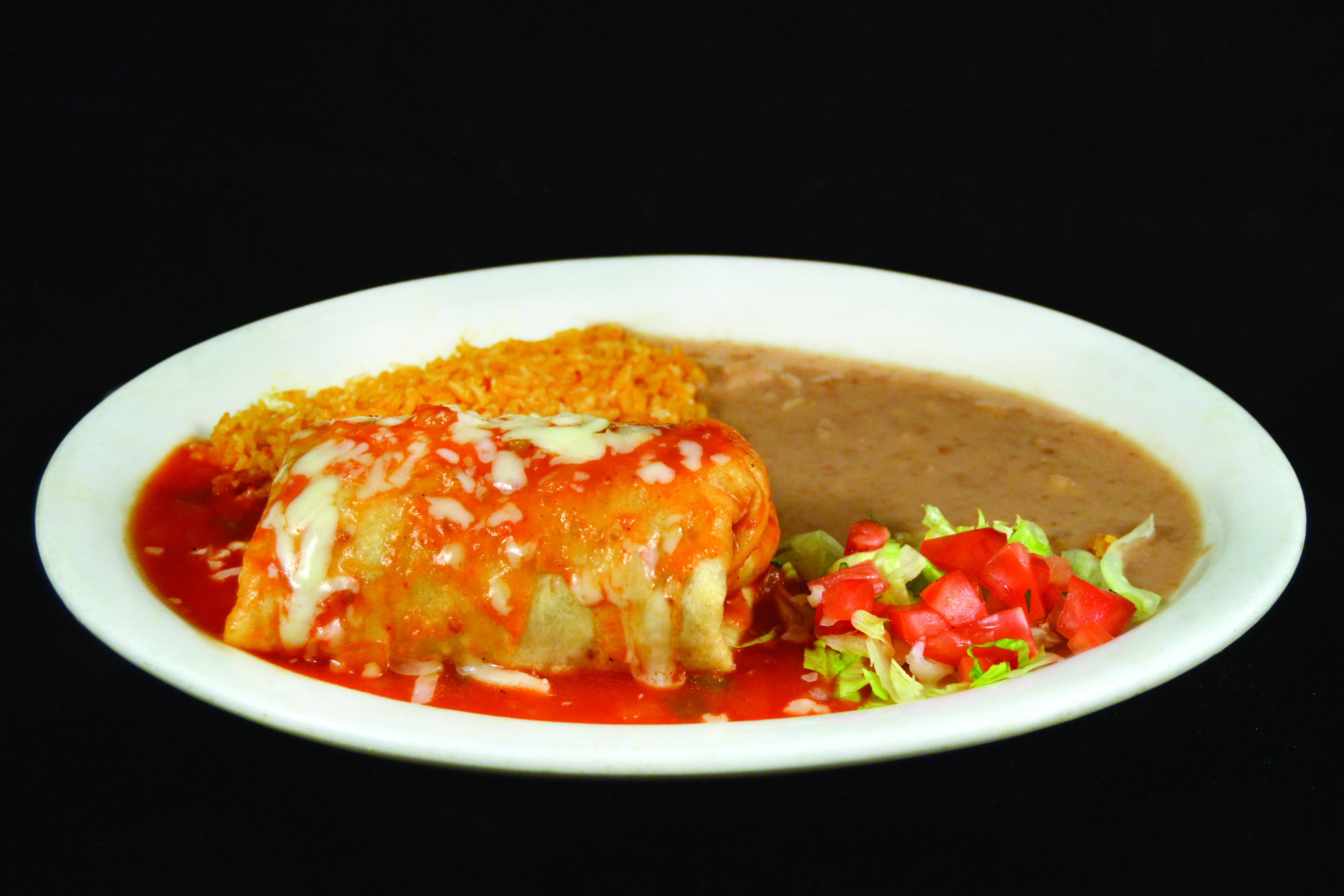 Order Chimichanga food online from Mi Comal Mexican Restaurant store, Irving on bringmethat.com