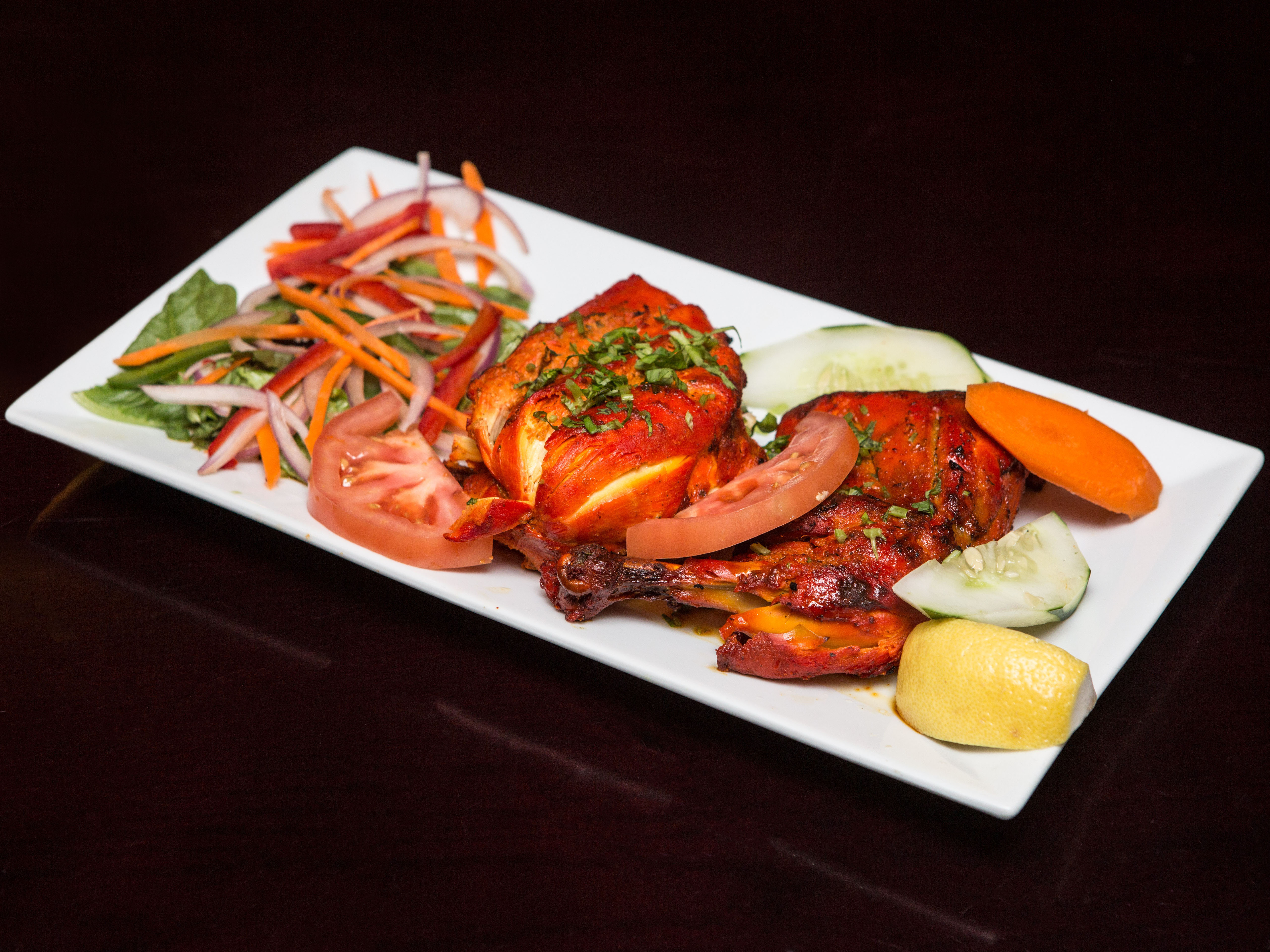 Order Tandoori Chicken food online from Anand Indian Cuisine store, New York on bringmethat.com