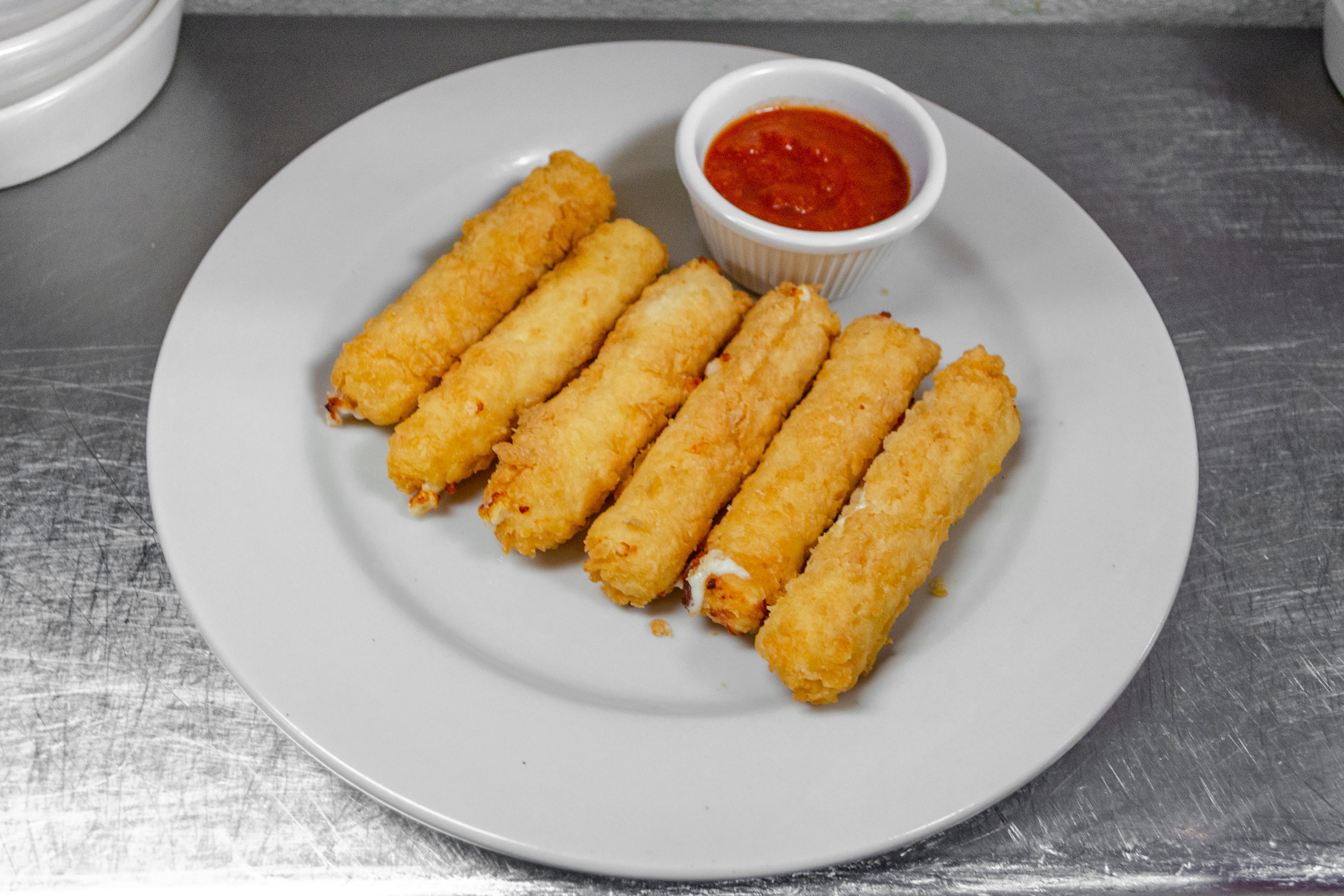 Order Fritters - Appetizer food online from Safari's Brick Oven & Grill store, Hendersonville on bringmethat.com