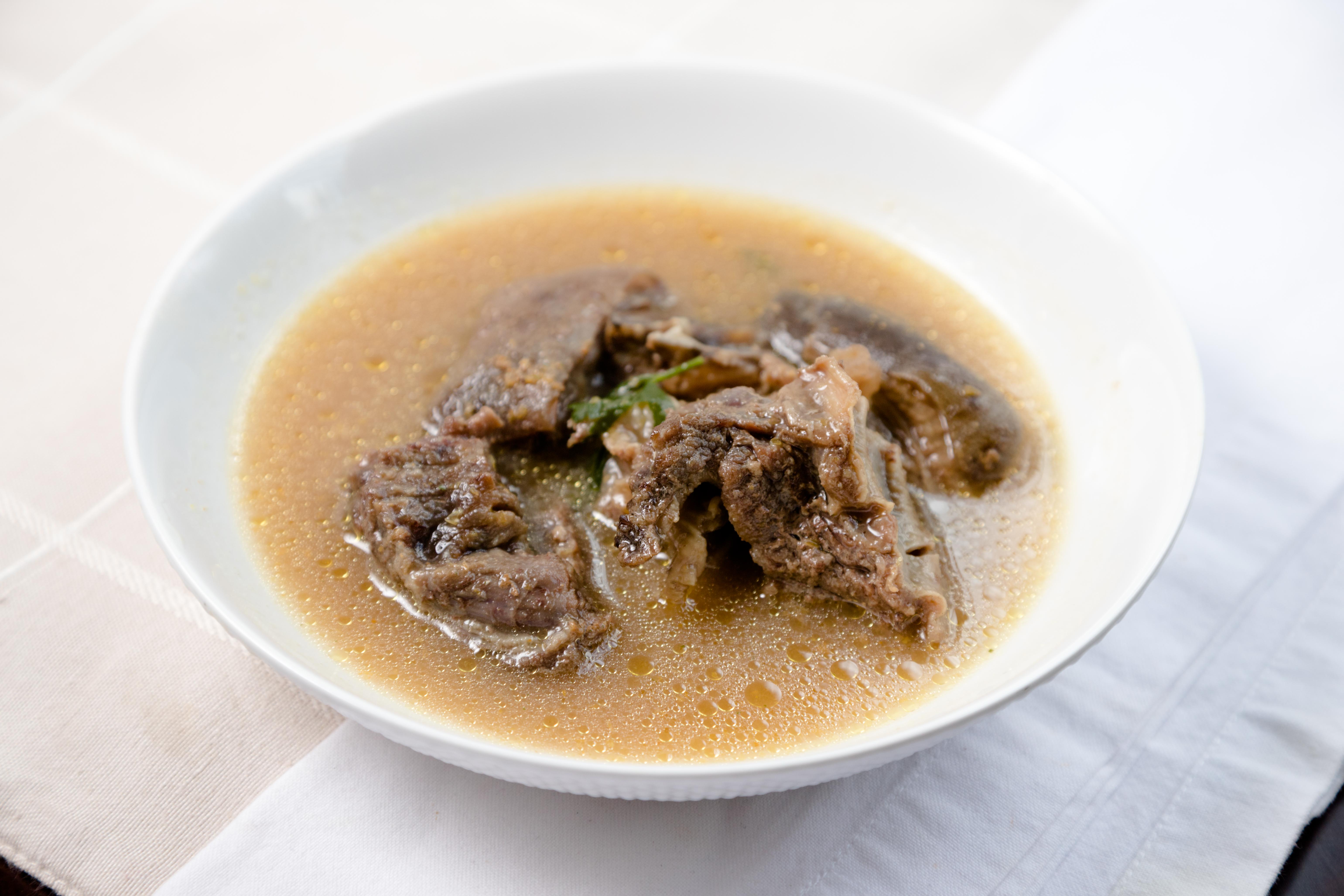 Order Goat Meat Pepper Soup food online from Naija Restaurant store, Newington on bringmethat.com