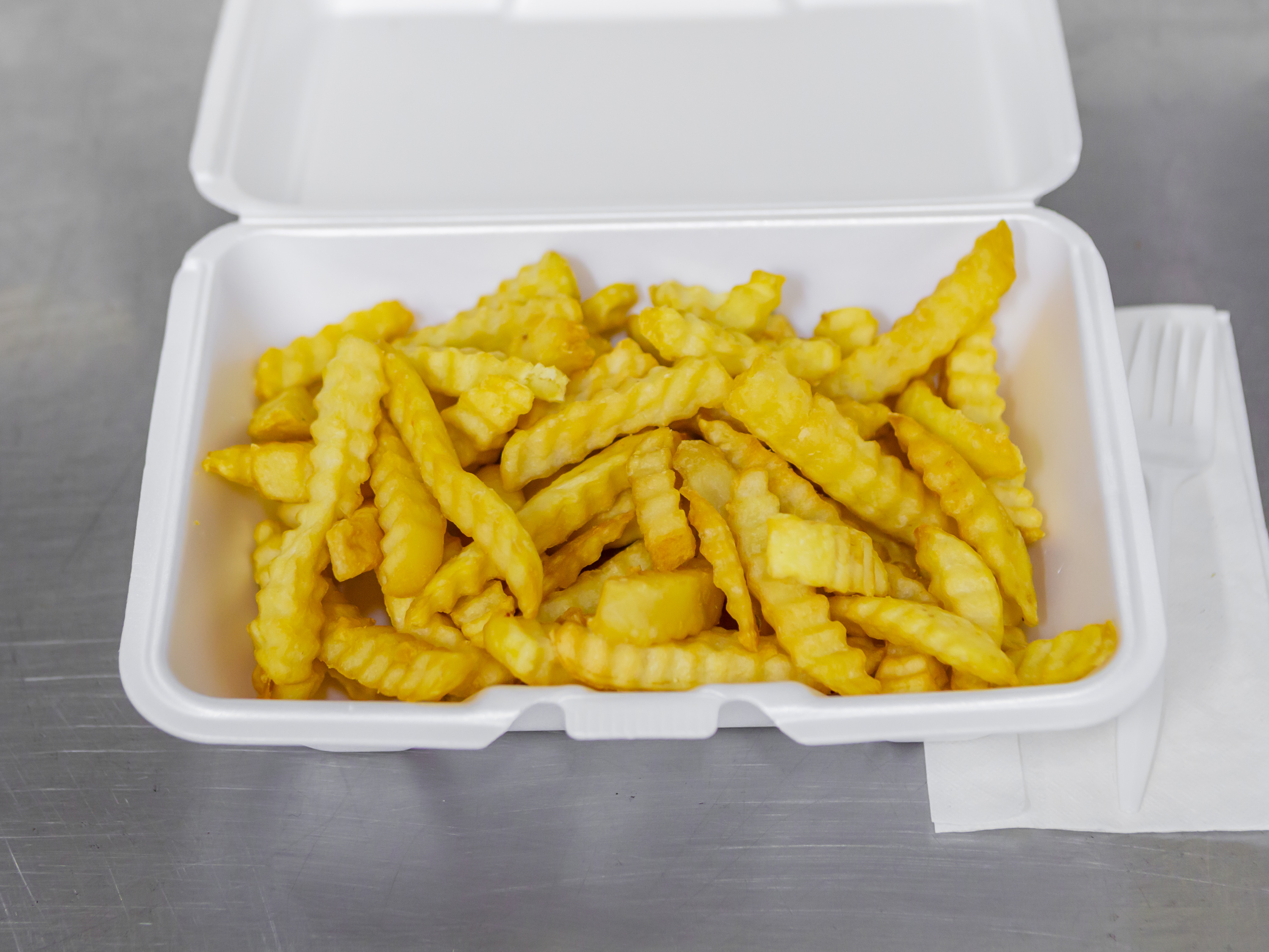 Order Fries food online from Uptown BBQ & Soulfood store, Detroit on bringmethat.com