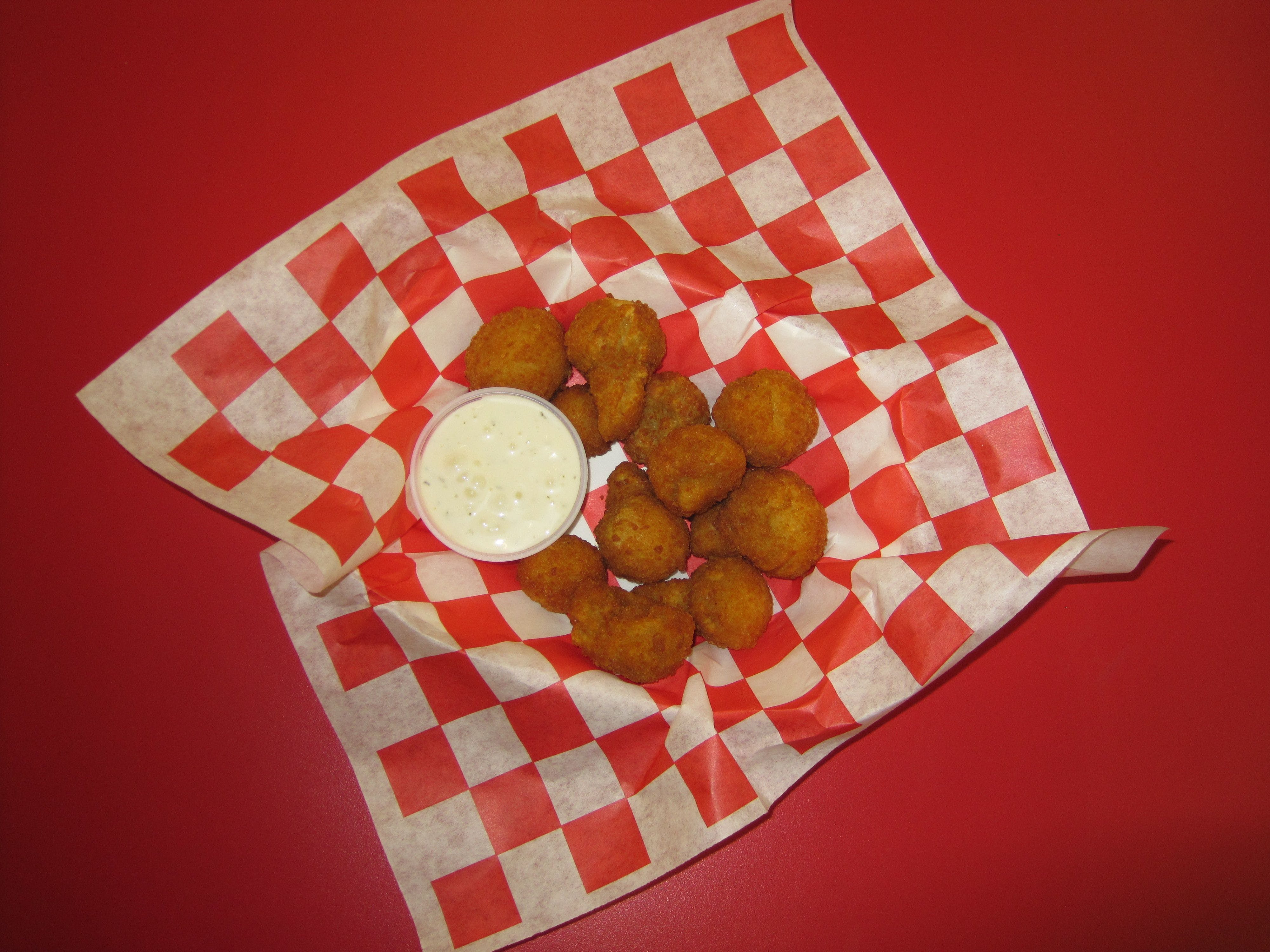 Order Fried Mushrooms - 1/2 lb. food online from Rocky's Pizzeria & Ice Cream store, North Chicago on bringmethat.com