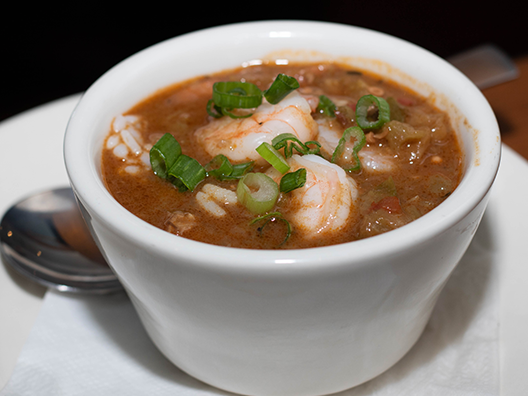 Order Louisiana Gumbo - Cup food online from Rockfish Seafood Grill store, McKinney on bringmethat.com