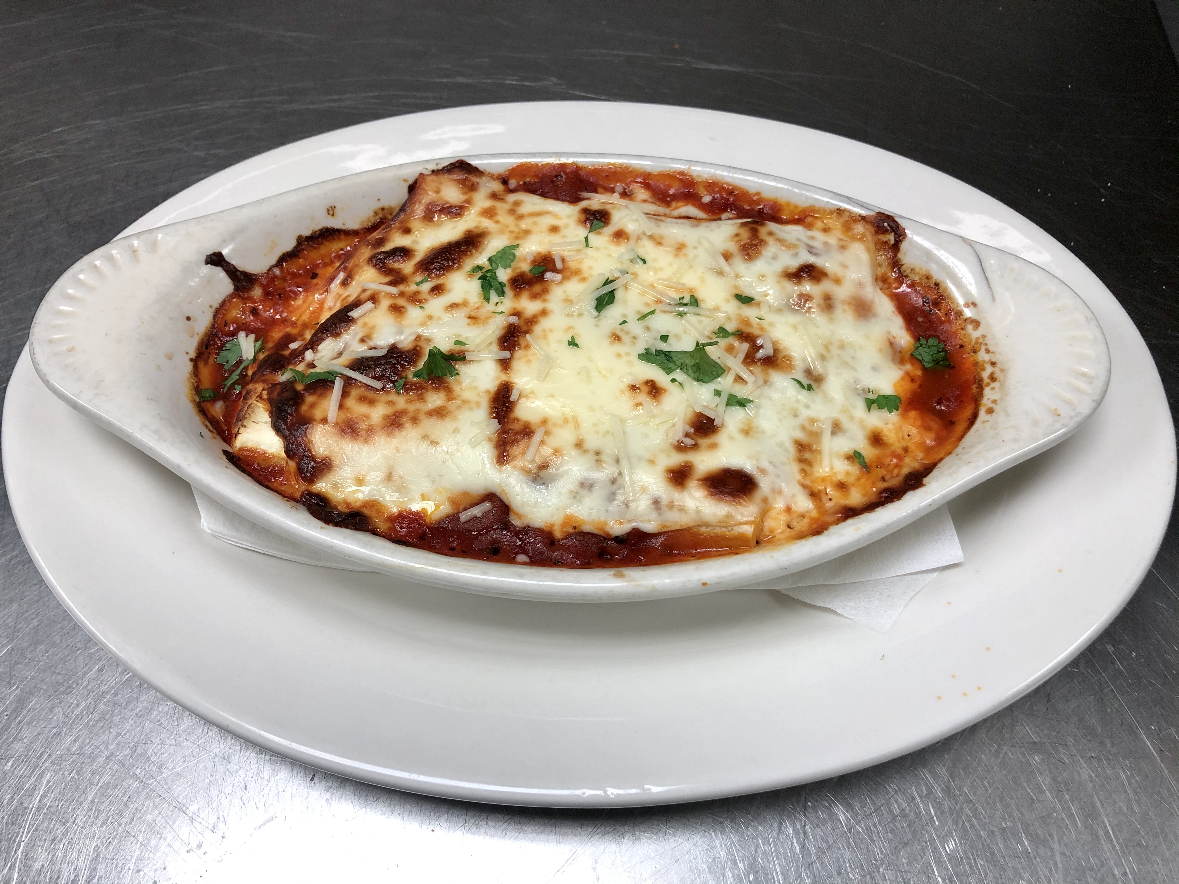 Order Cheese Manicotti Specialty food online from Vinny Italian Grill store, Fredericksburg on bringmethat.com