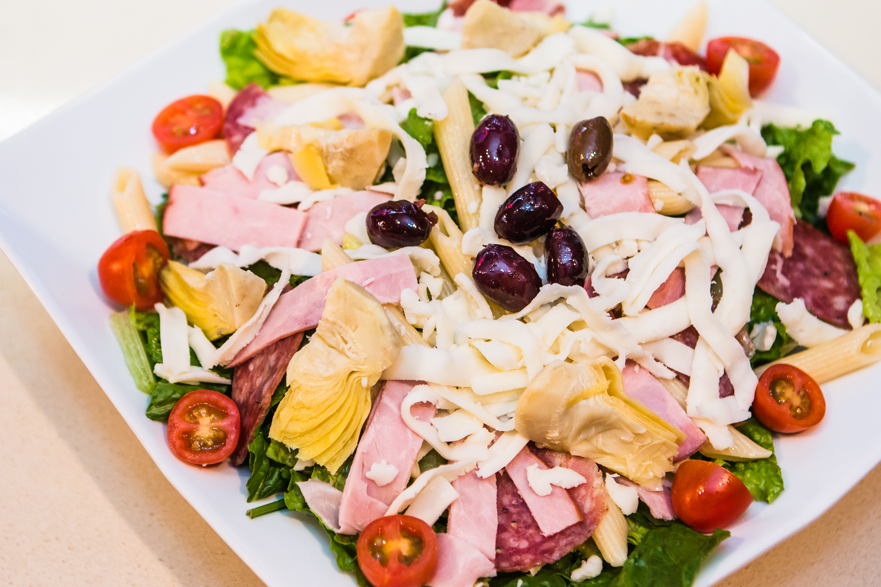 Order Napoli Salad food online from Panini Pizza & Italian Kitchen store, West Hollywood on bringmethat.com