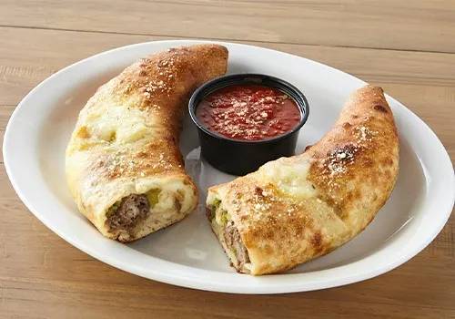 Order Syracuse Stuffer Stromboli food online from Johnny's New York Style Pizza store, Dallas on bringmethat.com