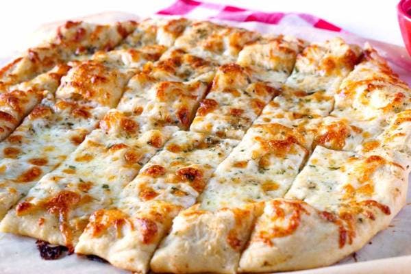 Order Cheese Breadsticks with Marinara Sauce - Appetizer food online from Golden Pizzeria store, Norfolk on bringmethat.com