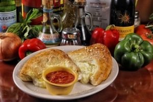 Order Cheese Calzone food online from Kelseys Pizza store, Titusville on bringmethat.com