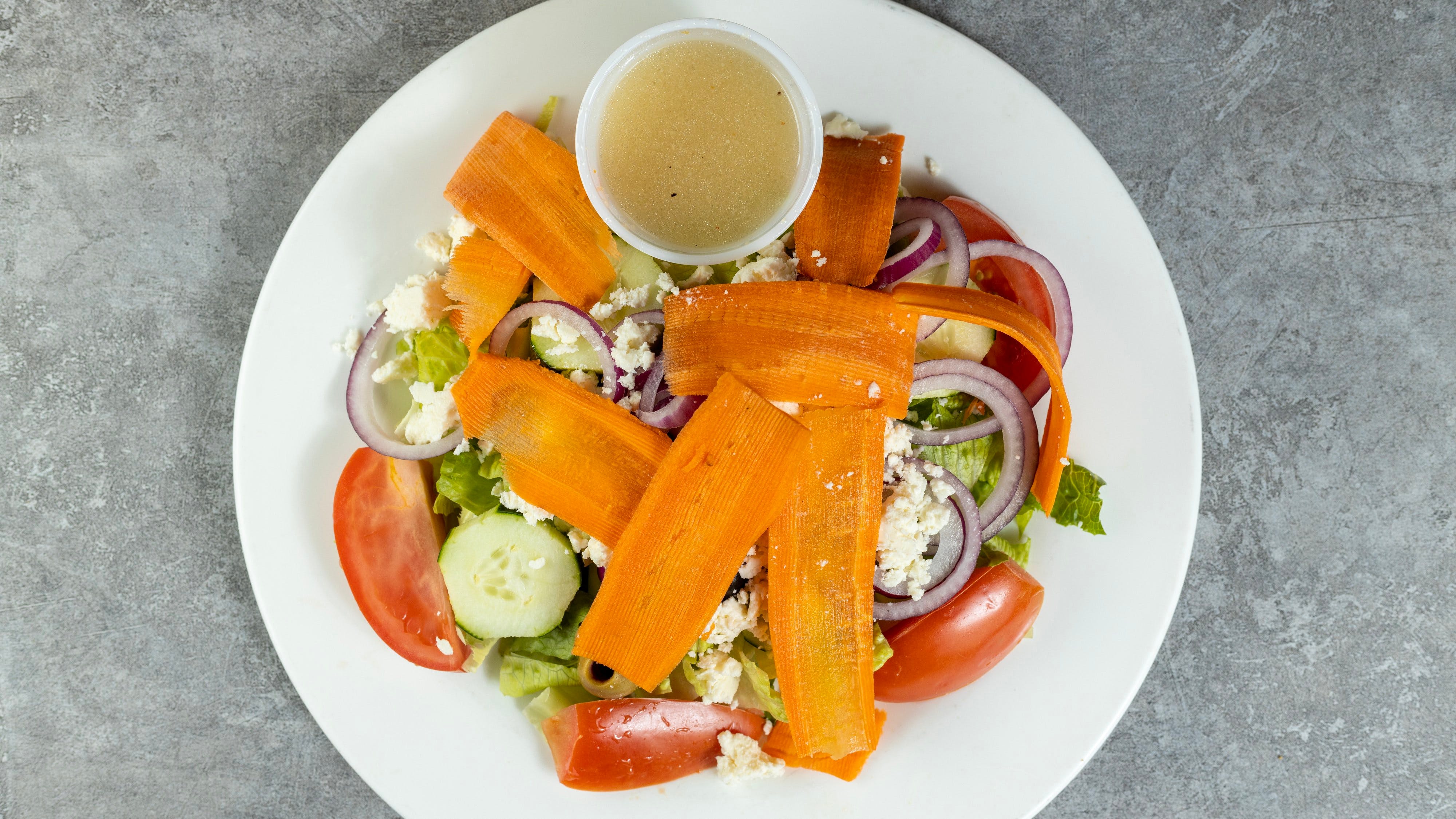 Order Greek Salad - Small food online from Regina Pizza store, Lynbrook on bringmethat.com