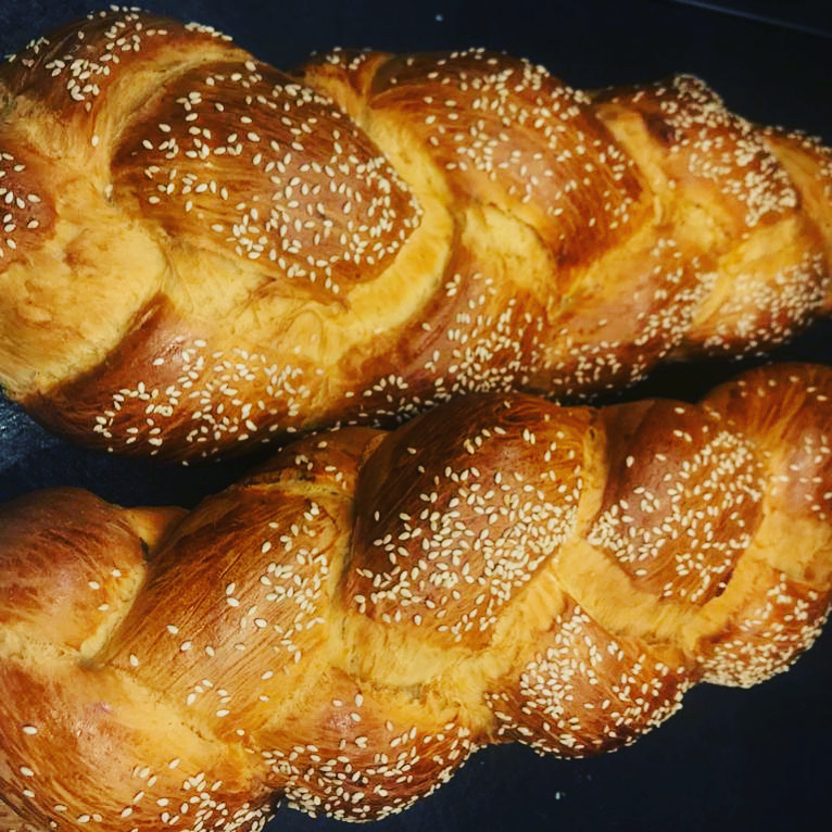 Order Tsoureki Braided round (Easter Bread) food online from Pi Bakerie and Eatery store, New York on bringmethat.com