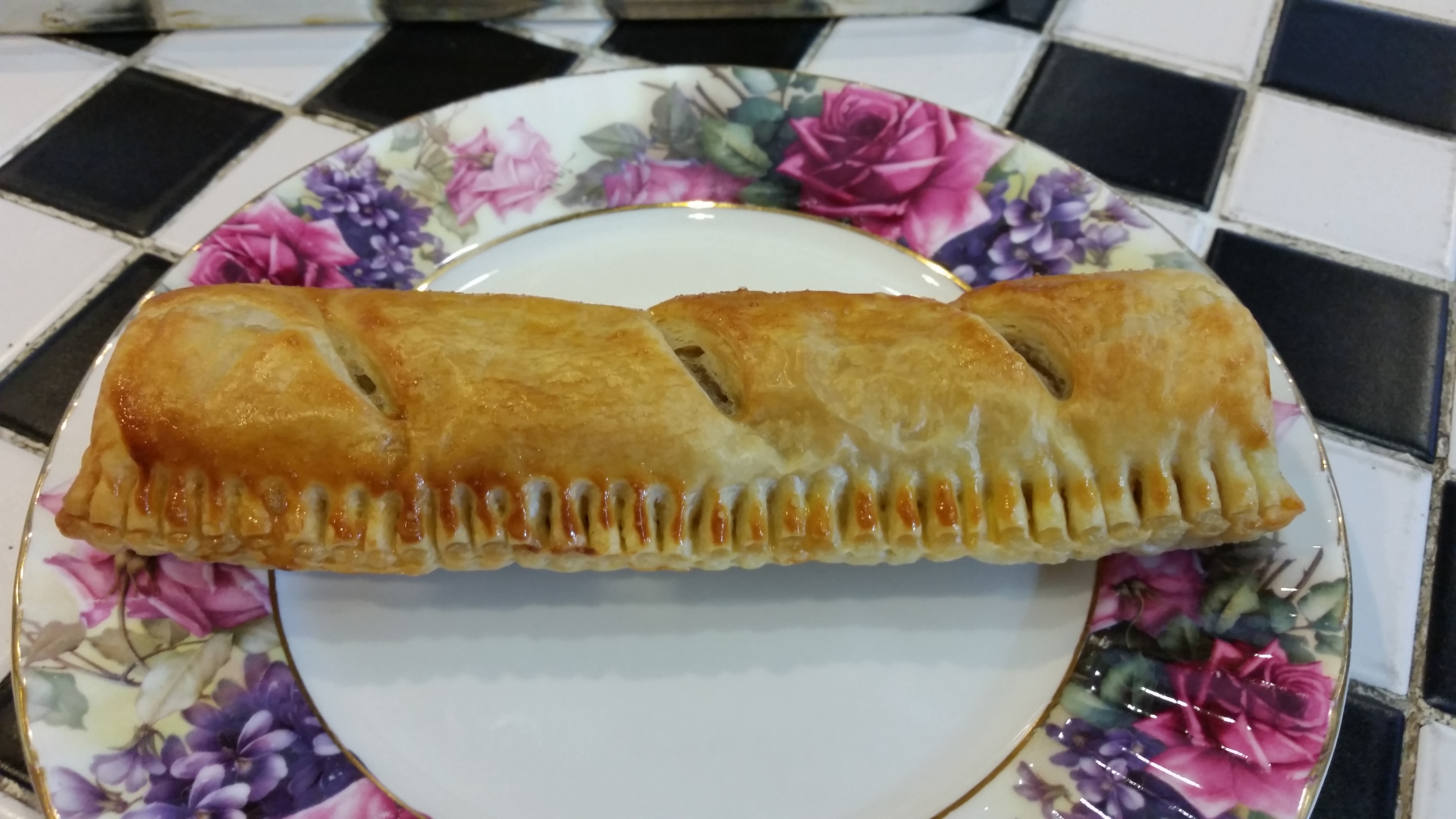 Order Jumbo Sausage Roll food online from Shakespeare's Corner Shoppe store, San Diego on bringmethat.com
