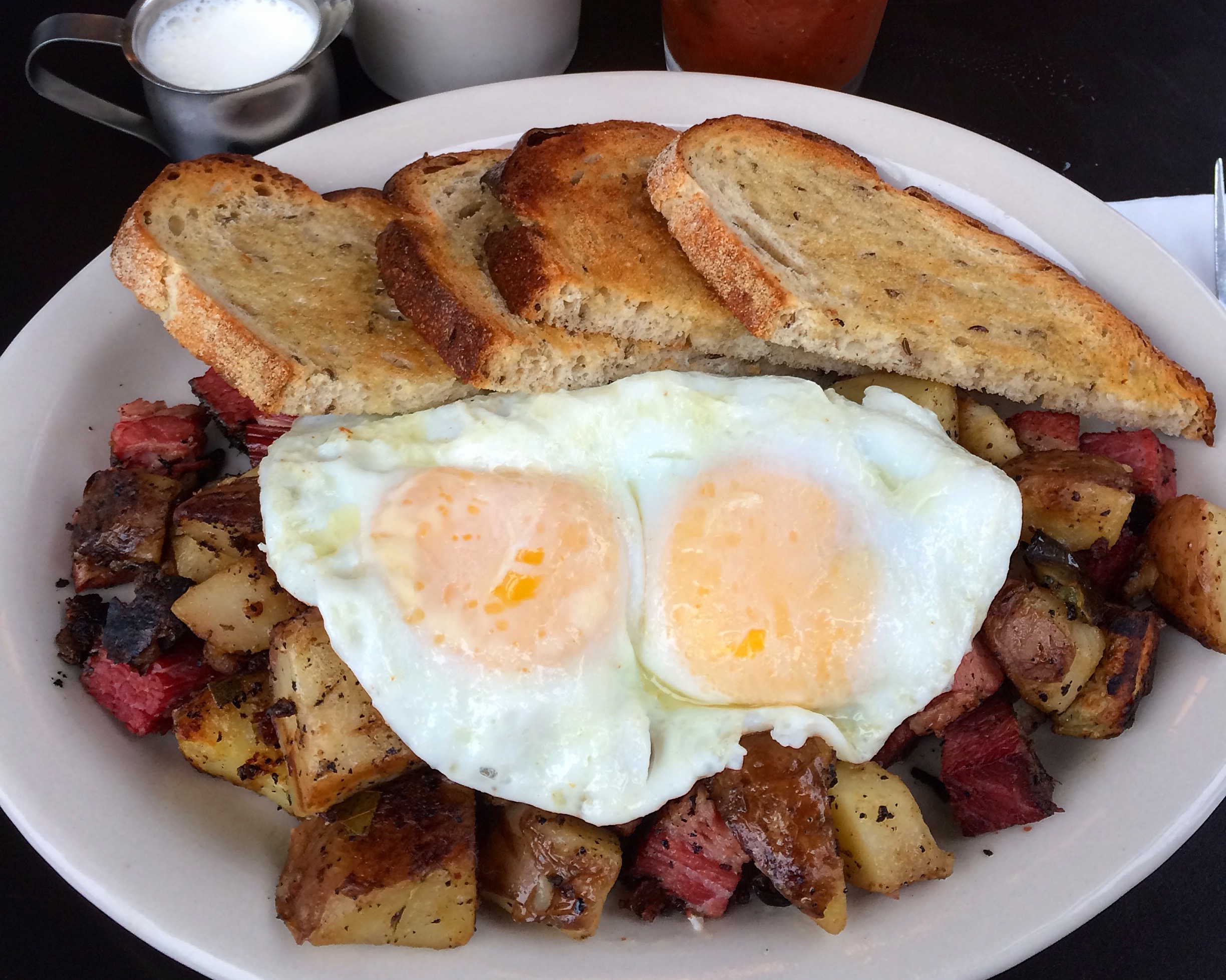 Order Corned Beef Hash with 2 Eggs food online from Kenny & Zuke Deli store, Portland on bringmethat.com