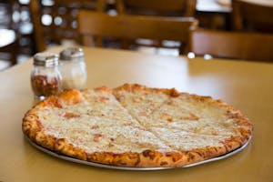 Order 2-Topping Pizza food online from Massino's Pizzeria store, Aurora on bringmethat.com