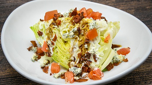Order Wedge Salad food online from Saltgrass Steak House store, Arlington on bringmethat.com