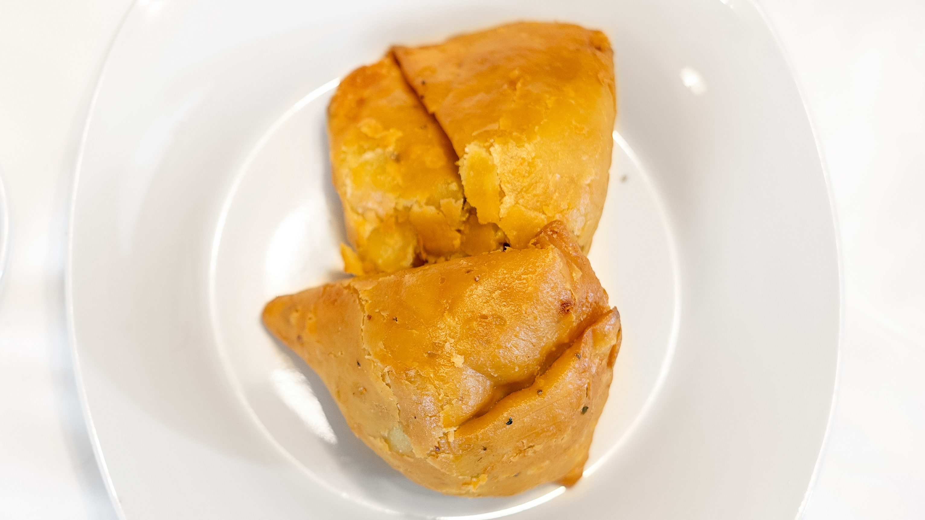 Order 5. Vegetable Samosa (2 Pieces) food online from Swagat indian restaurant store, New York on bringmethat.com