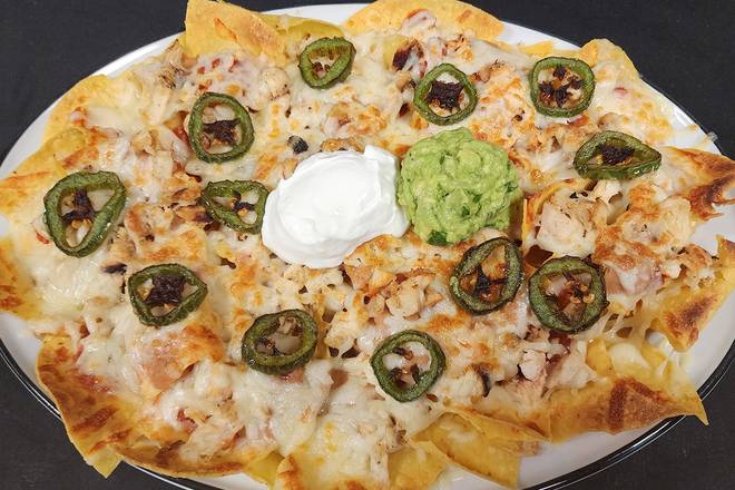 Order NACHOS food online from 54th Street Grill and Bar store, Chesterfield on bringmethat.com