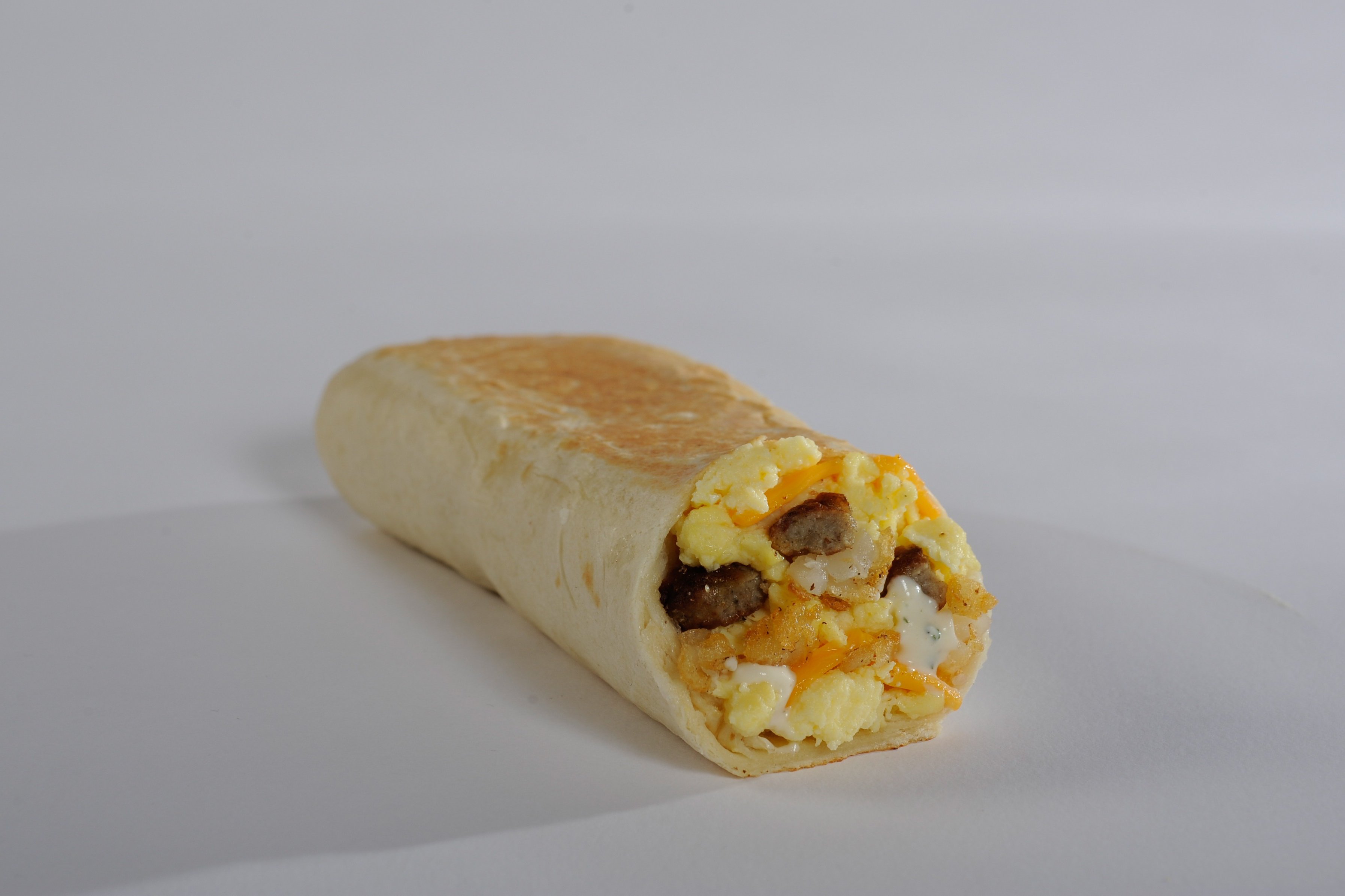 Order Grande Breakfast Burrito Combo Meal food online from Amigos / Kings Classic store, Lincoln on bringmethat.com
