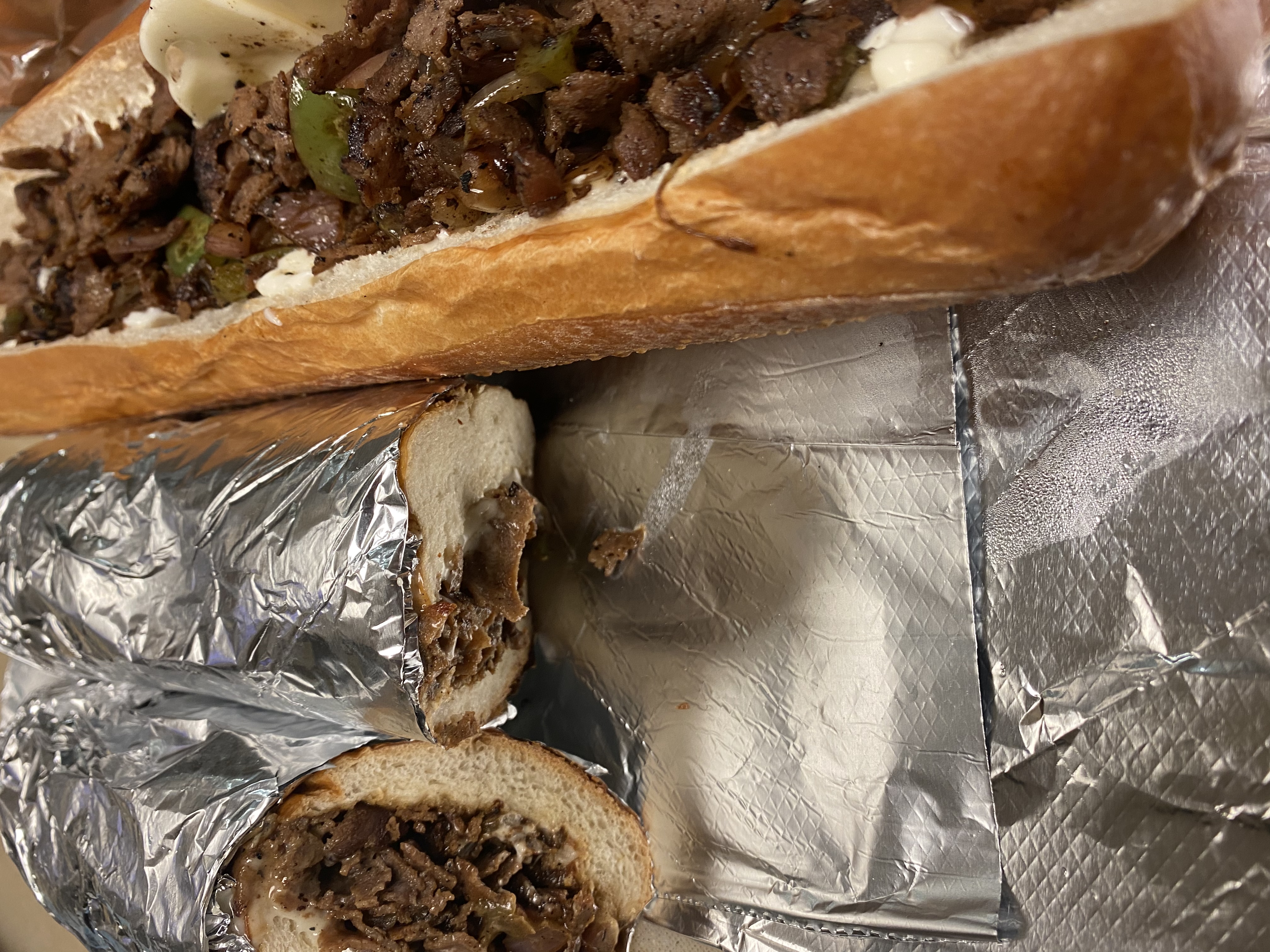 Order Philly Cheese Steak Sandwich food online from Mix Grill & Wings store, St. Louis on bringmethat.com