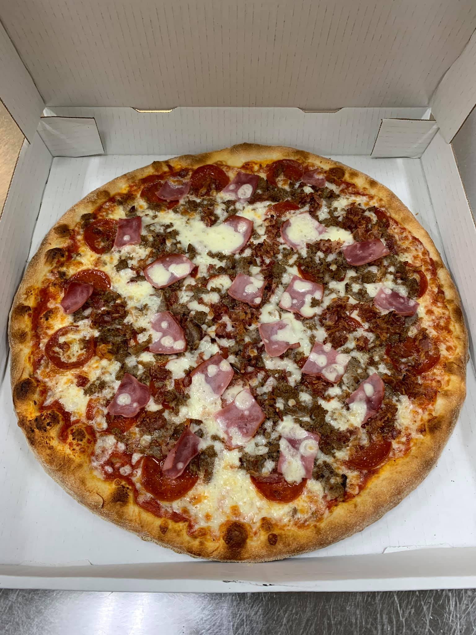 Order Meat Lover's Pizza food online from Napoli Pizza store, Miamisburg on bringmethat.com