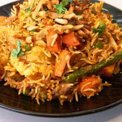 Order VEGETABLE BIRYANI (61) food online from Kabob & Curry store, Providence on bringmethat.com