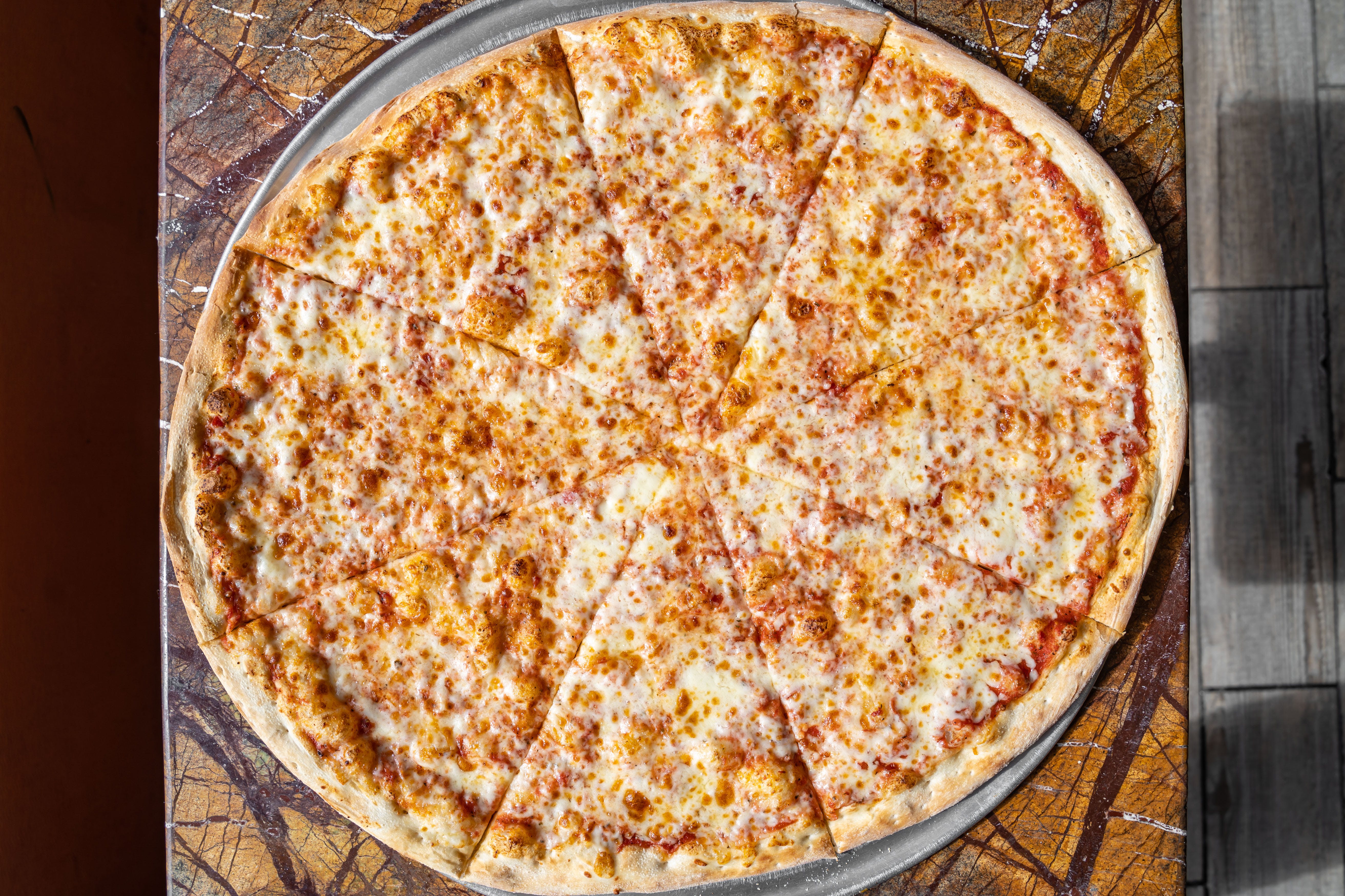 Order Cheese Pizza - Medium 12'' food online from Rana Halal Cuisine store, Philadelphia on bringmethat.com