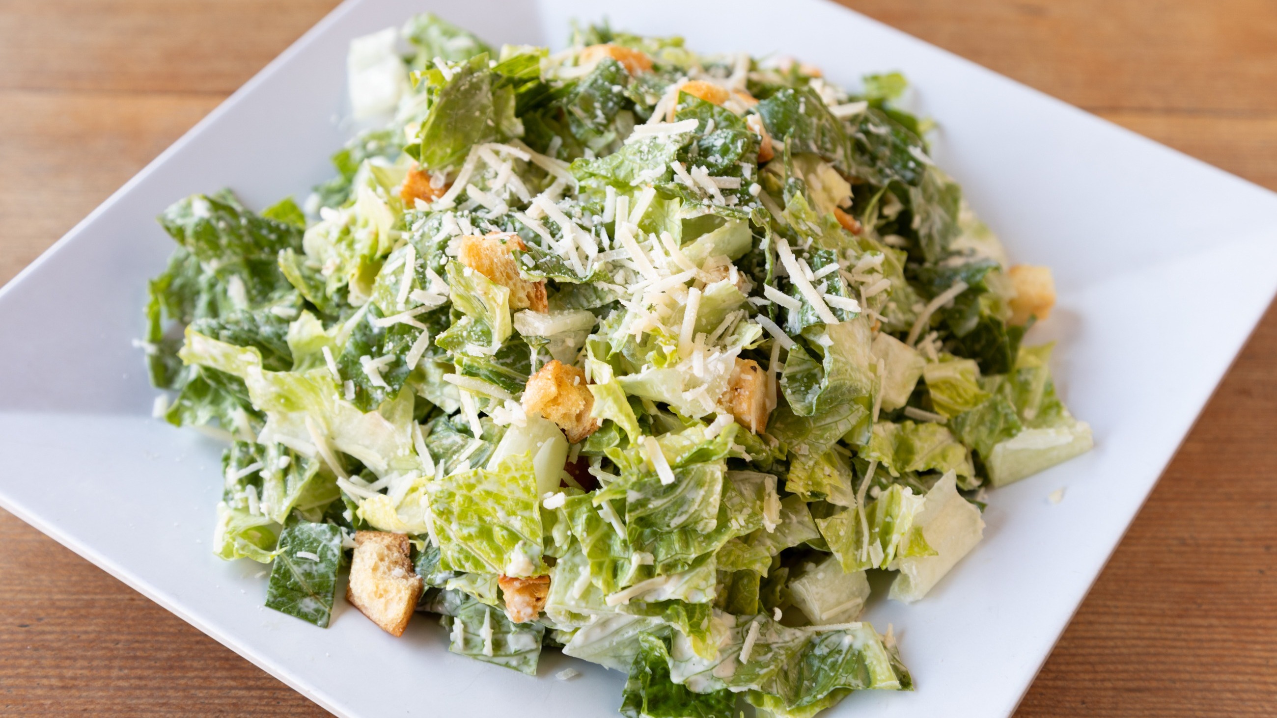 Order Caesar Salad food online from Stout Burger store, Palm Springs on bringmethat.com