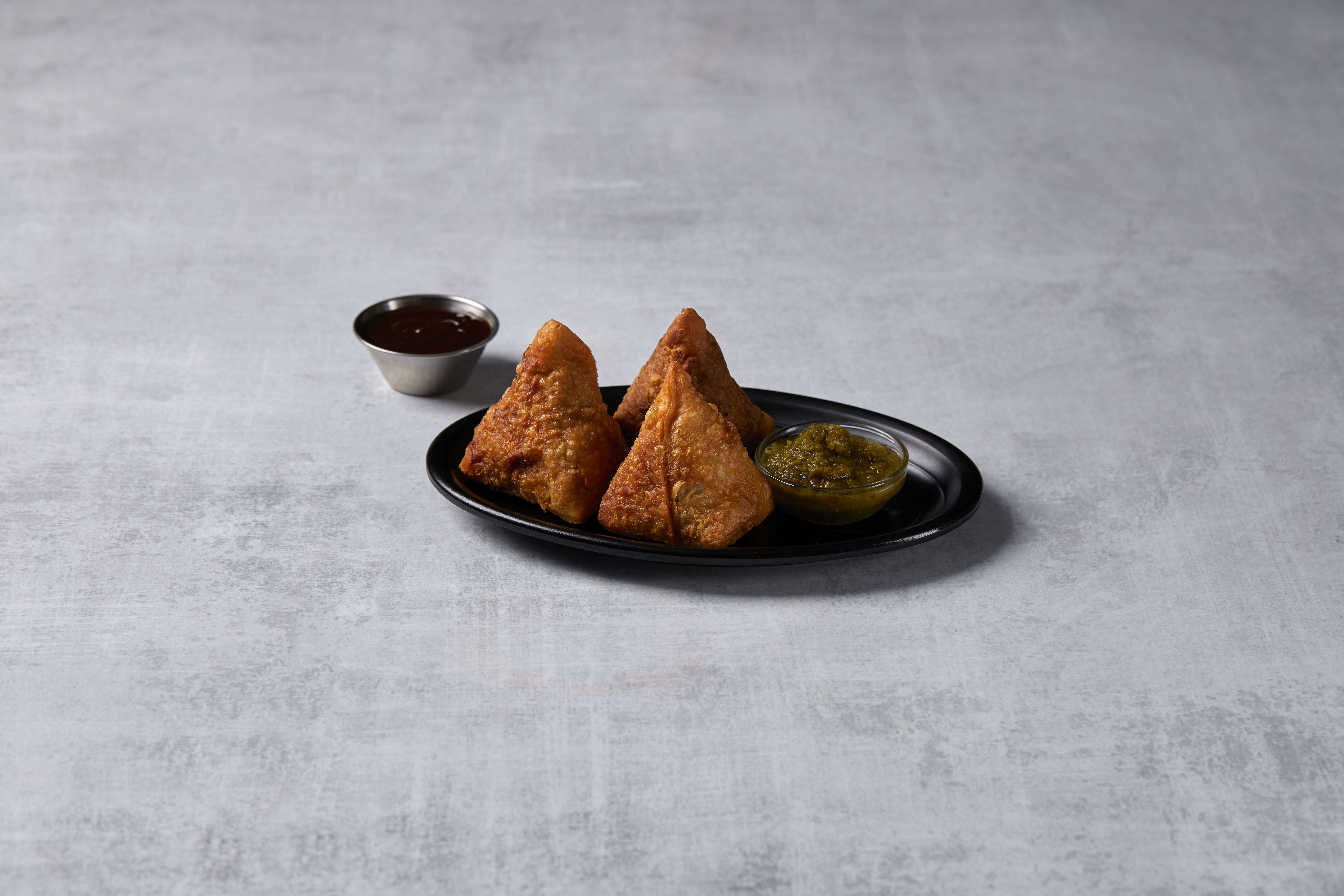 Order Vegetable Samosa food online from Kamal Palace Cuisine of India store, Long Beach on bringmethat.com