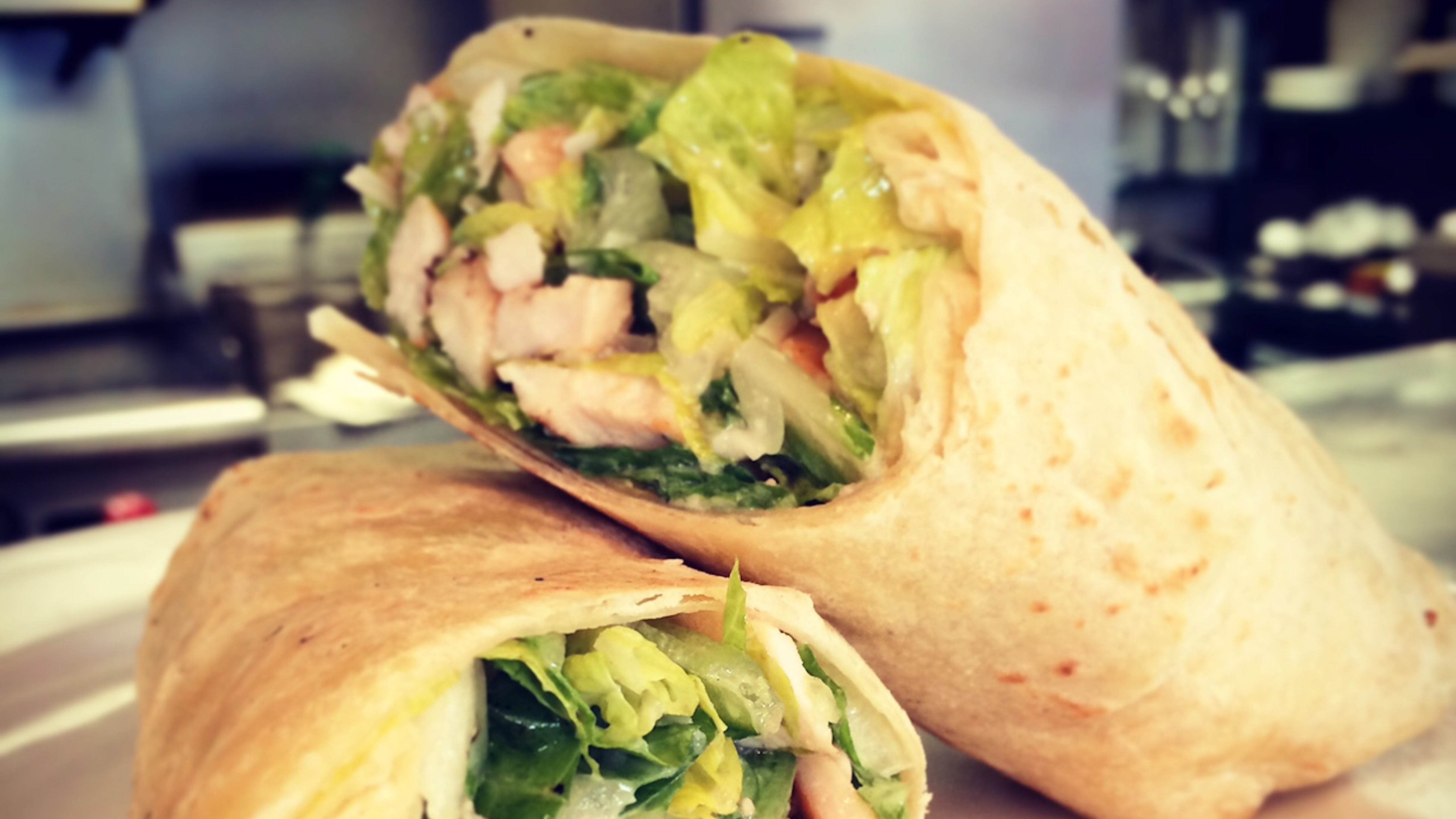 Order The Chicken Caesar Wrap food online from Old Town Cafe store, Camarillo on bringmethat.com