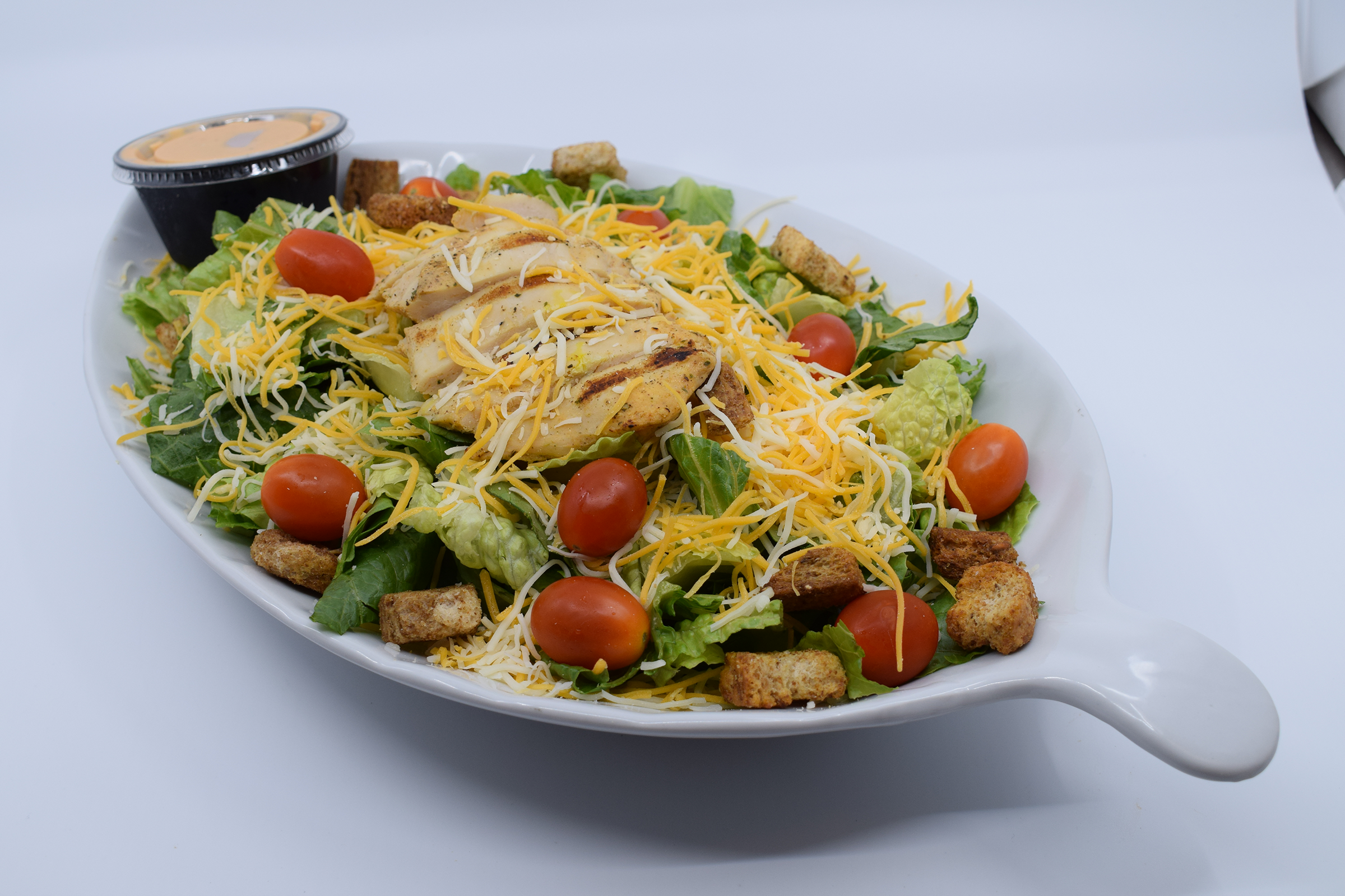Order SPICY CHIPOTLE CHICKEN SALAD food online from Mad House Comedy Club store, San Diego on bringmethat.com