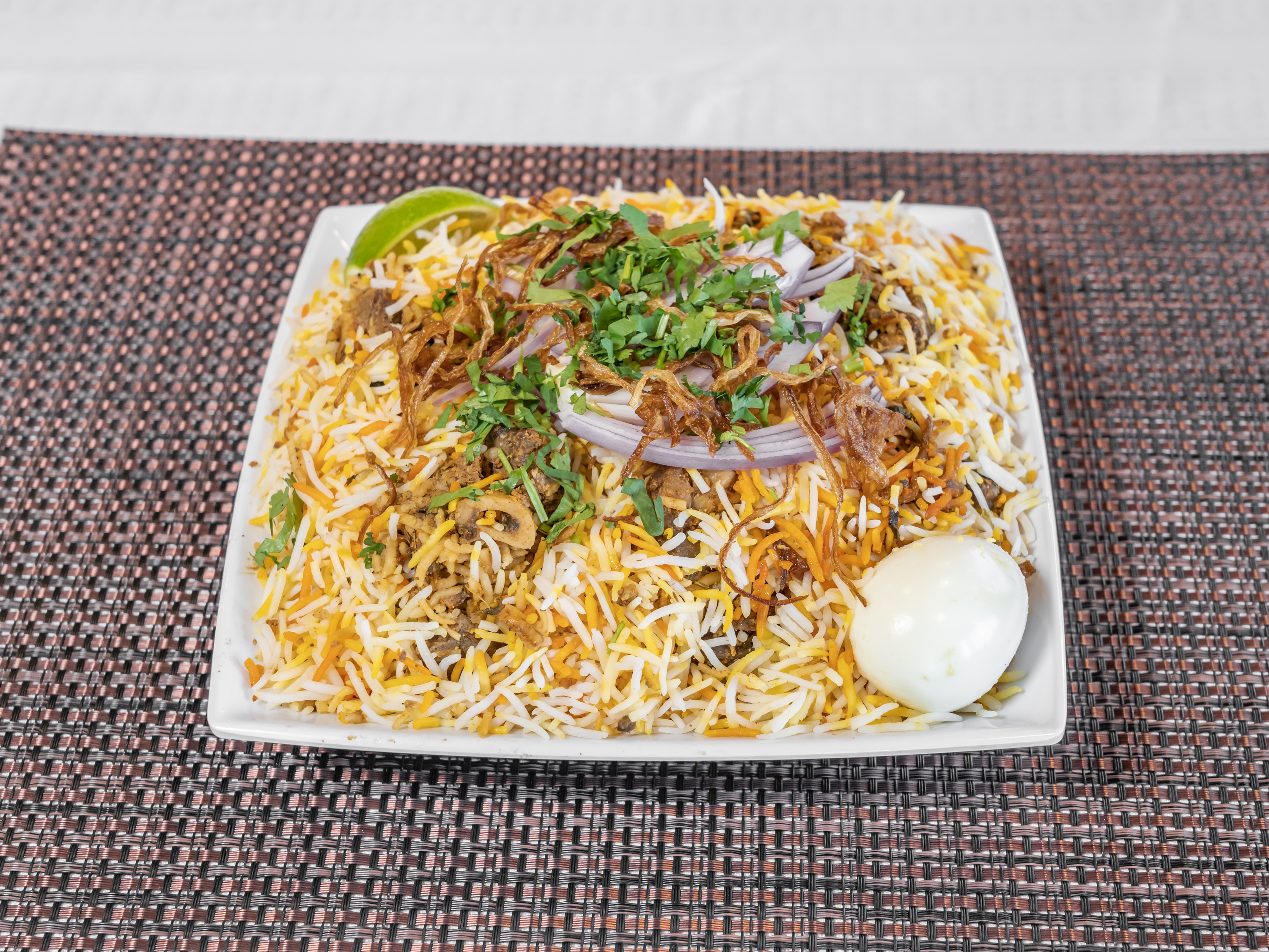 Order 65. Goat Dum Biryani food online from Charminar Biryani House store, Troy on bringmethat.com
