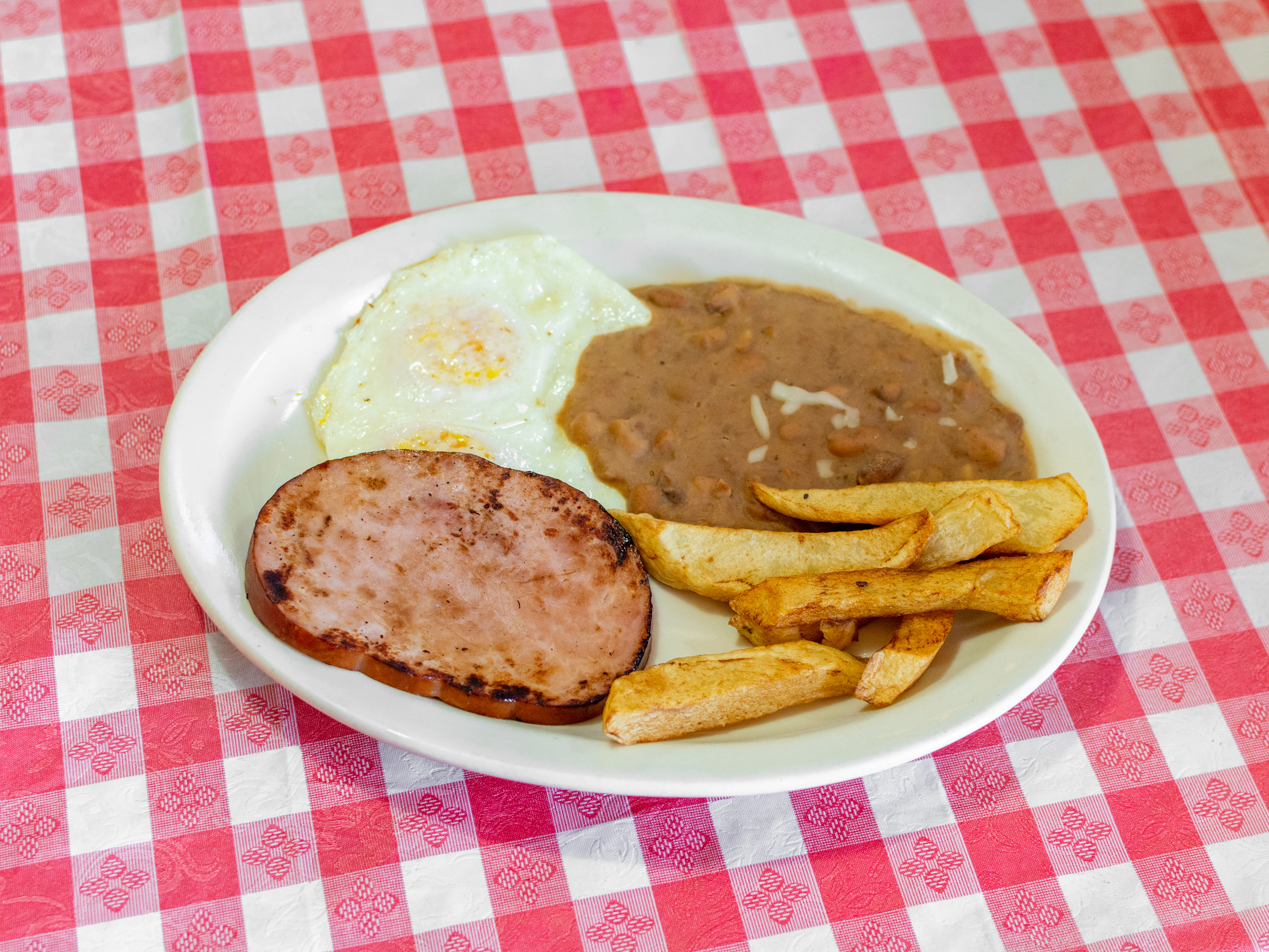 Order 6. Two Eggs and Ham food online from Julia Mexican Restaurant store, Fresno on bringmethat.com