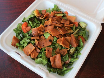 Order Fattoush Salad food online from Tarboosh Mediterranean Restaurant store, Allston on bringmethat.com