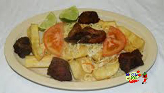 Order Yuca con Chicharron  food online from Mi Casa De Sabor Bar & Grill store, Houston on bringmethat.com