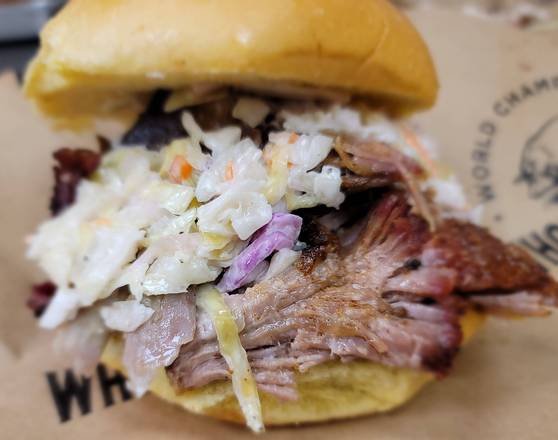 Order Pulled Pork Sandwich food online from Whole Hog Cafe store, Yonkers on bringmethat.com