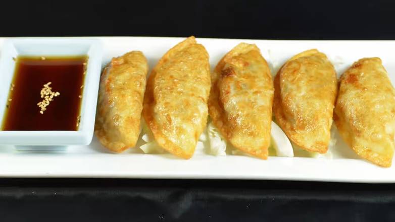 Order Gyoza food online from Ichiban Japanese Bistro & Steakhouse store, Grand Blanc on bringmethat.com