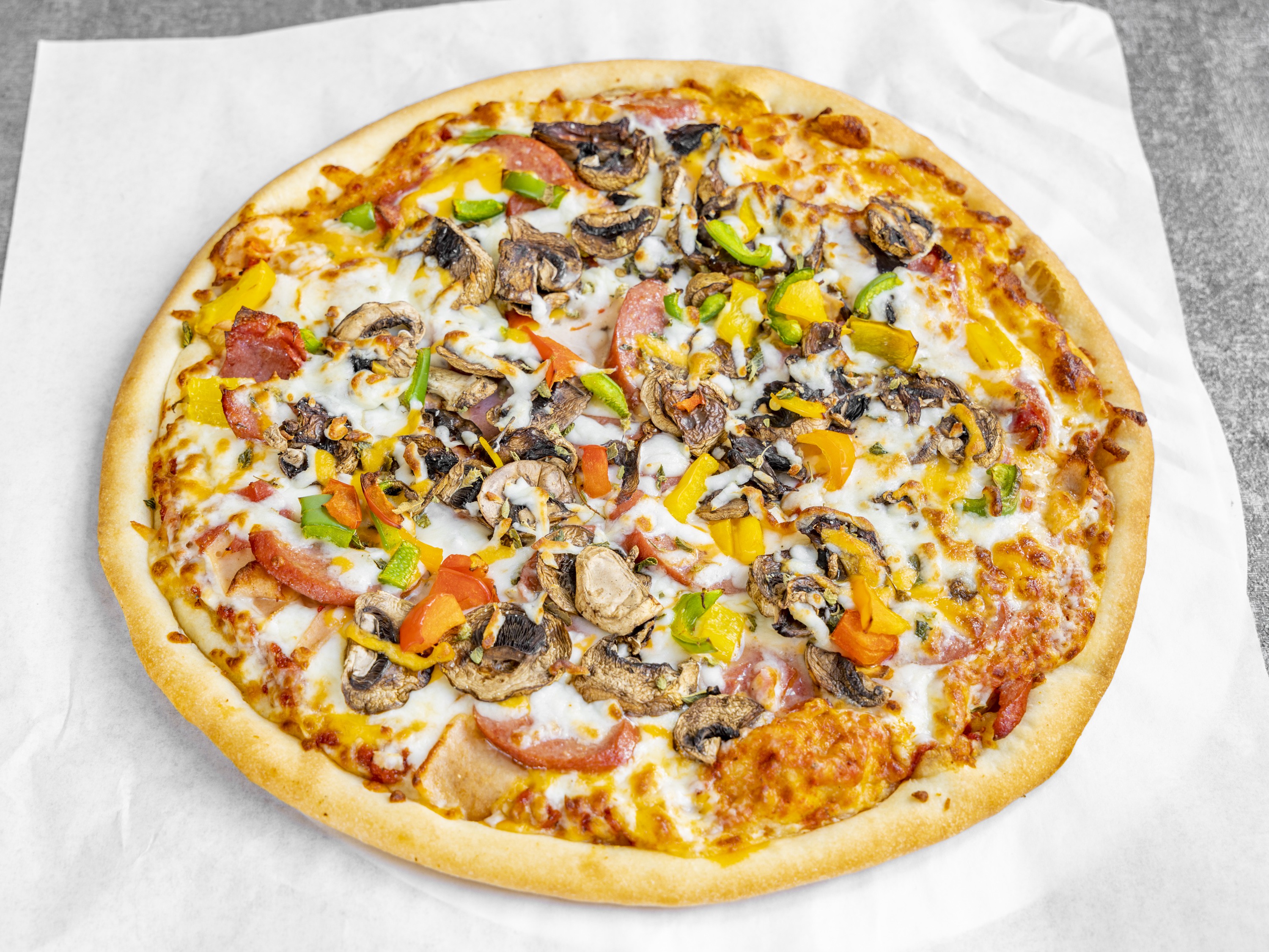 Order Combo Pizza food online from Momos Grill store, Irvine on bringmethat.com
