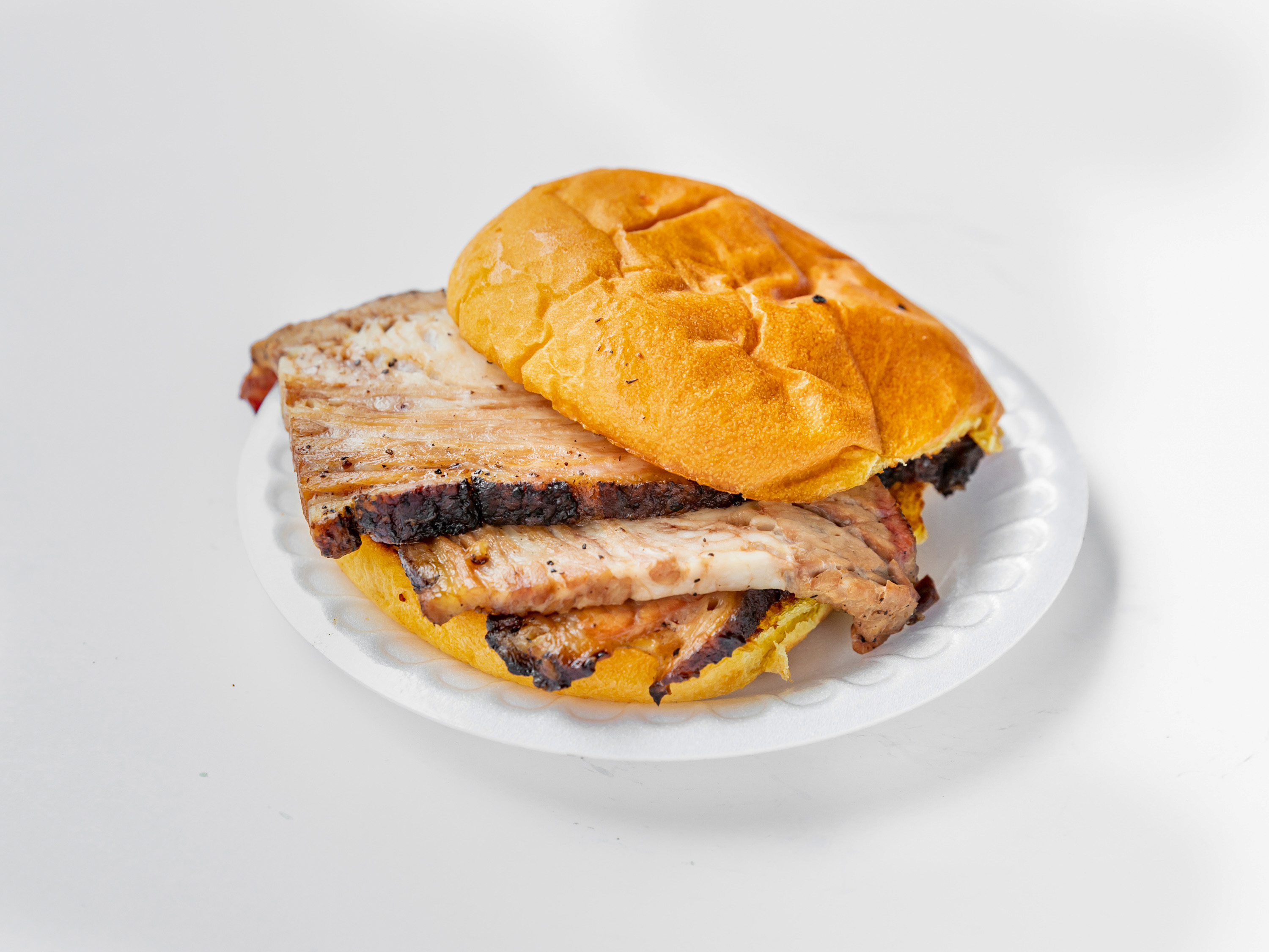 Order Smoked Beef Brisket Sandwich food online from Bullpen Rib House store, Atlanta on bringmethat.com