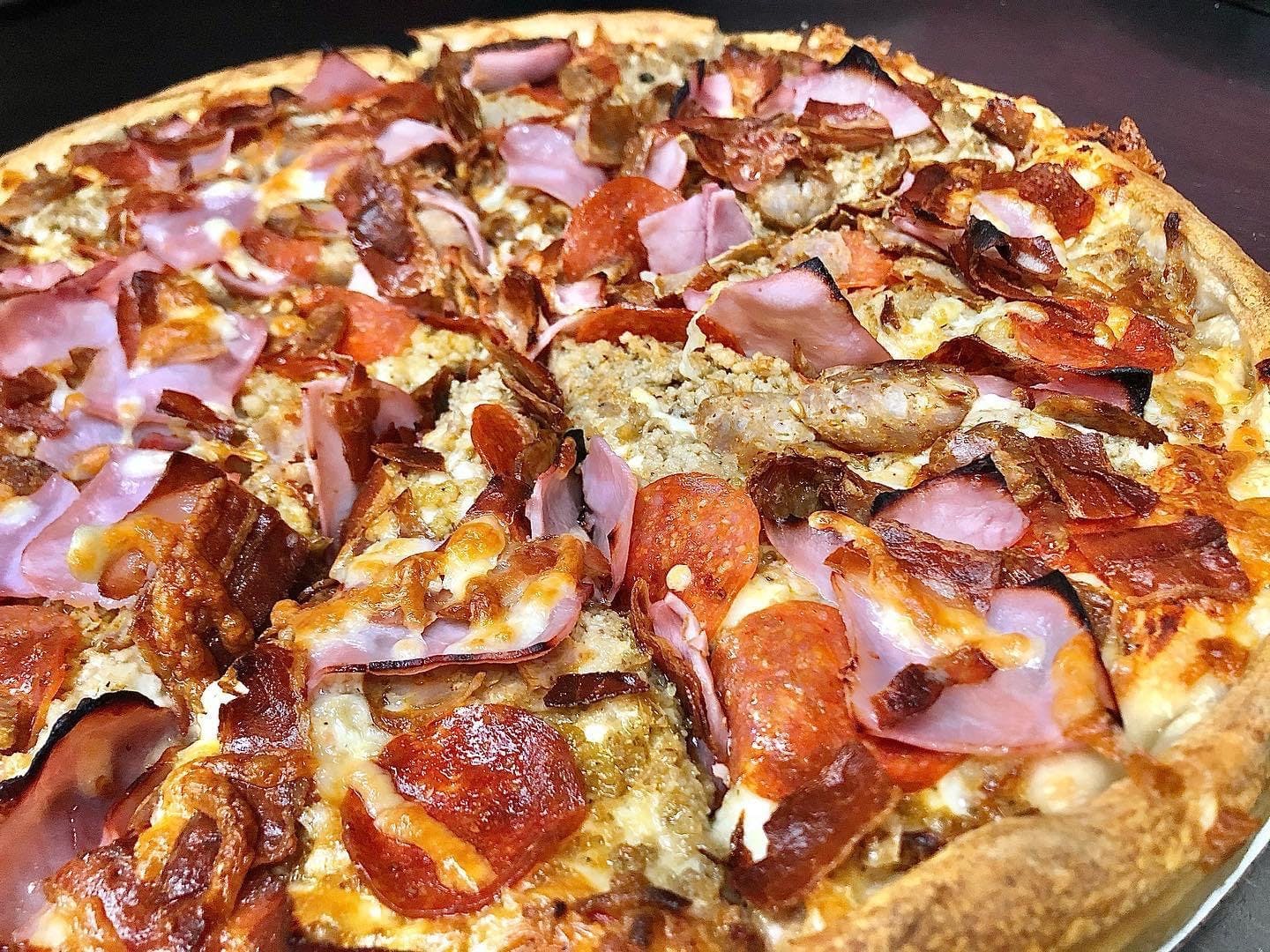 Order Meat Lovers Pizza - Small food online from Kelley Square Pizza store, Worcester on bringmethat.com