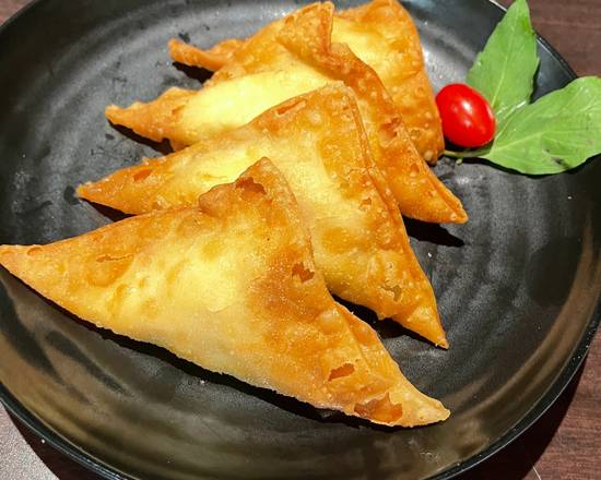 Order Crab Rangoon (4 pieces) food online from Oh My Grill store, Honolulu on bringmethat.com