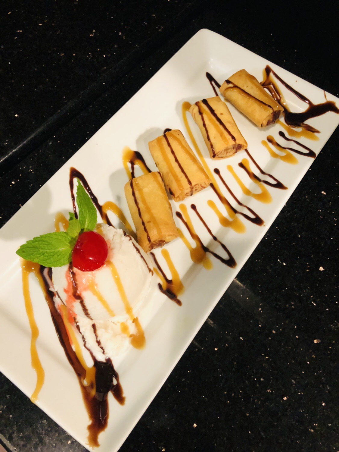 Order Fried banana with Coconut Ice cream food online from Exotic Thai Cafe store, Woodland Hills on bringmethat.com