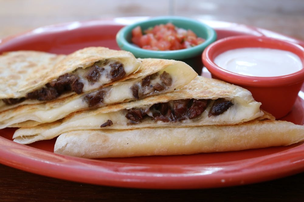 Order Quesadilla De Carne food online from Mad Dog And Beans store, New York on bringmethat.com