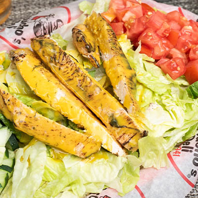 Order *Marinated Chicken Salad food online from Groucho's Deli store, Spartanburg on bringmethat.com